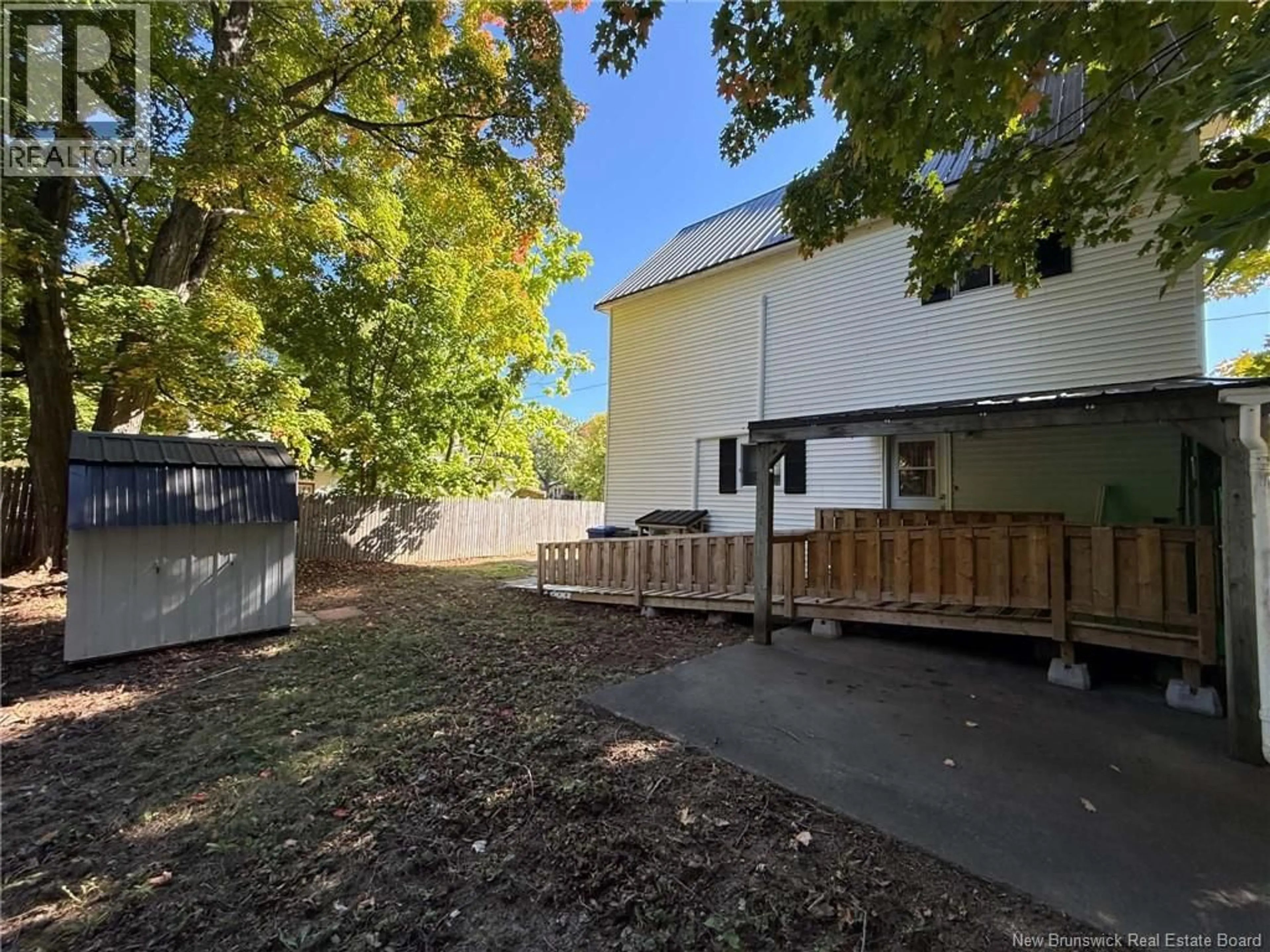 A pic from outside/outdoor area/front of a property/back of a property/a pic from drone, street for 106 COLLEGE STREET, Woodstock New Brunswick E7M1K6