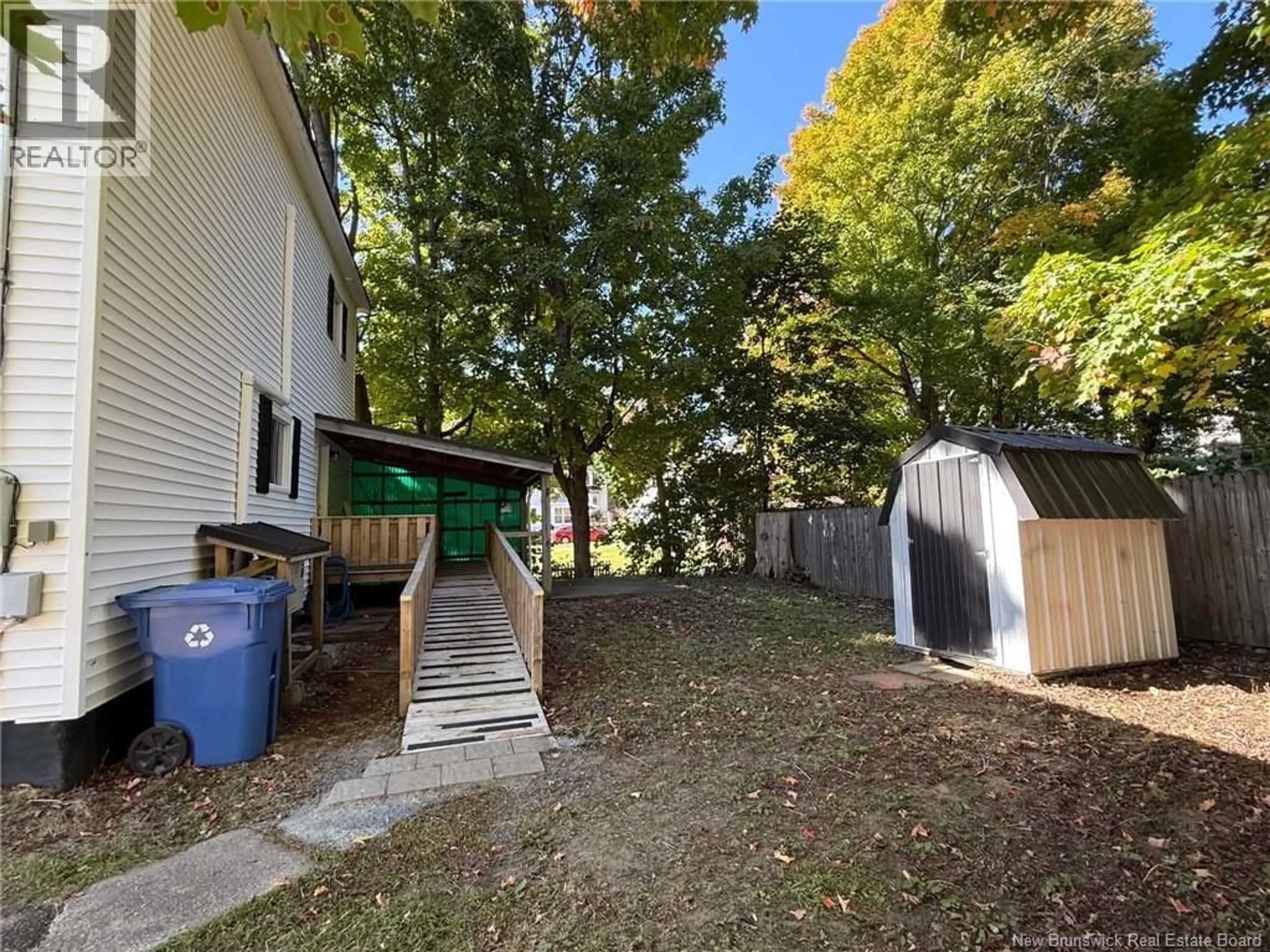 A pic from outside/outdoor area/front of a property/back of a property/a pic from drone, street for 106 COLLEGE STREET, Woodstock New Brunswick E7M1K6