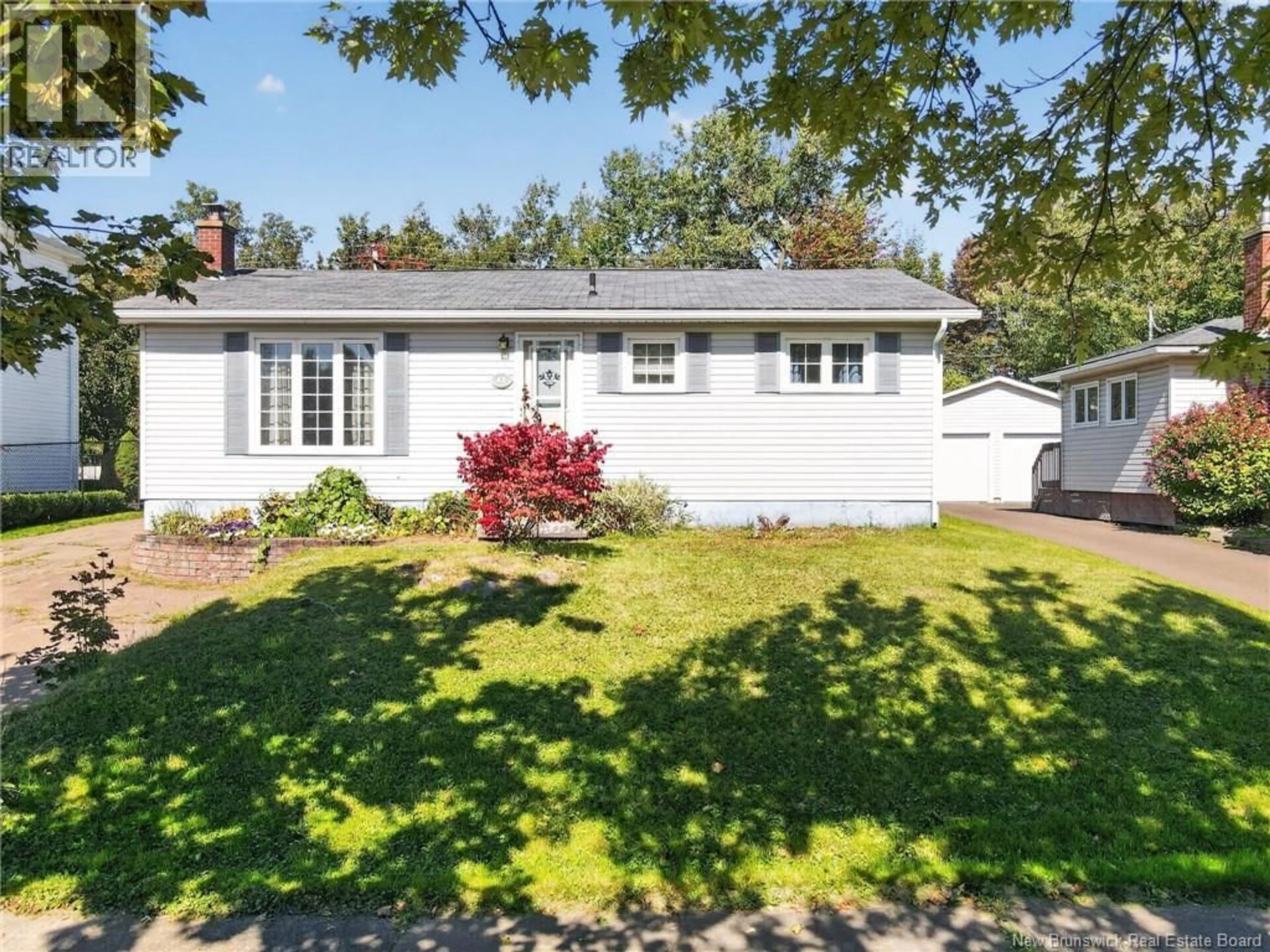 Home with vinyl exterior material, street for 57 LABROSSE ROAD, Moncton New Brunswick E1A4W9