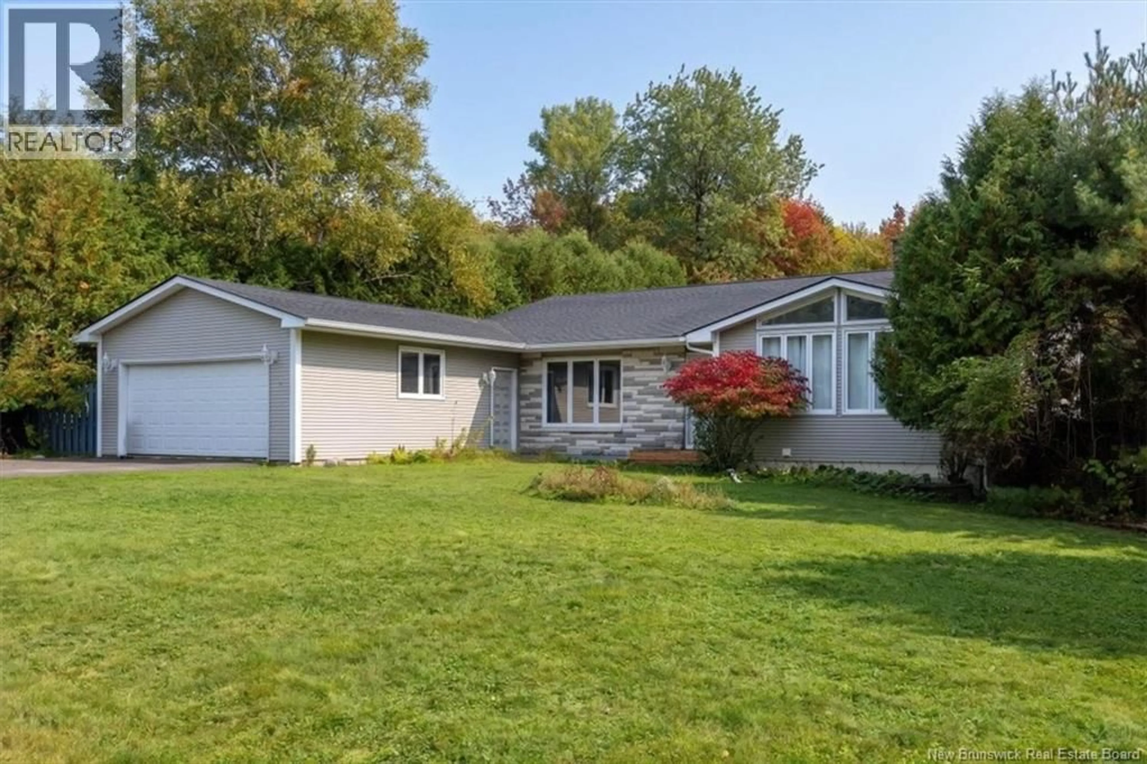 Home with vinyl exterior material, street for 4 HUGHES CRESCENT, Quispamsis New Brunswick E2E2S9