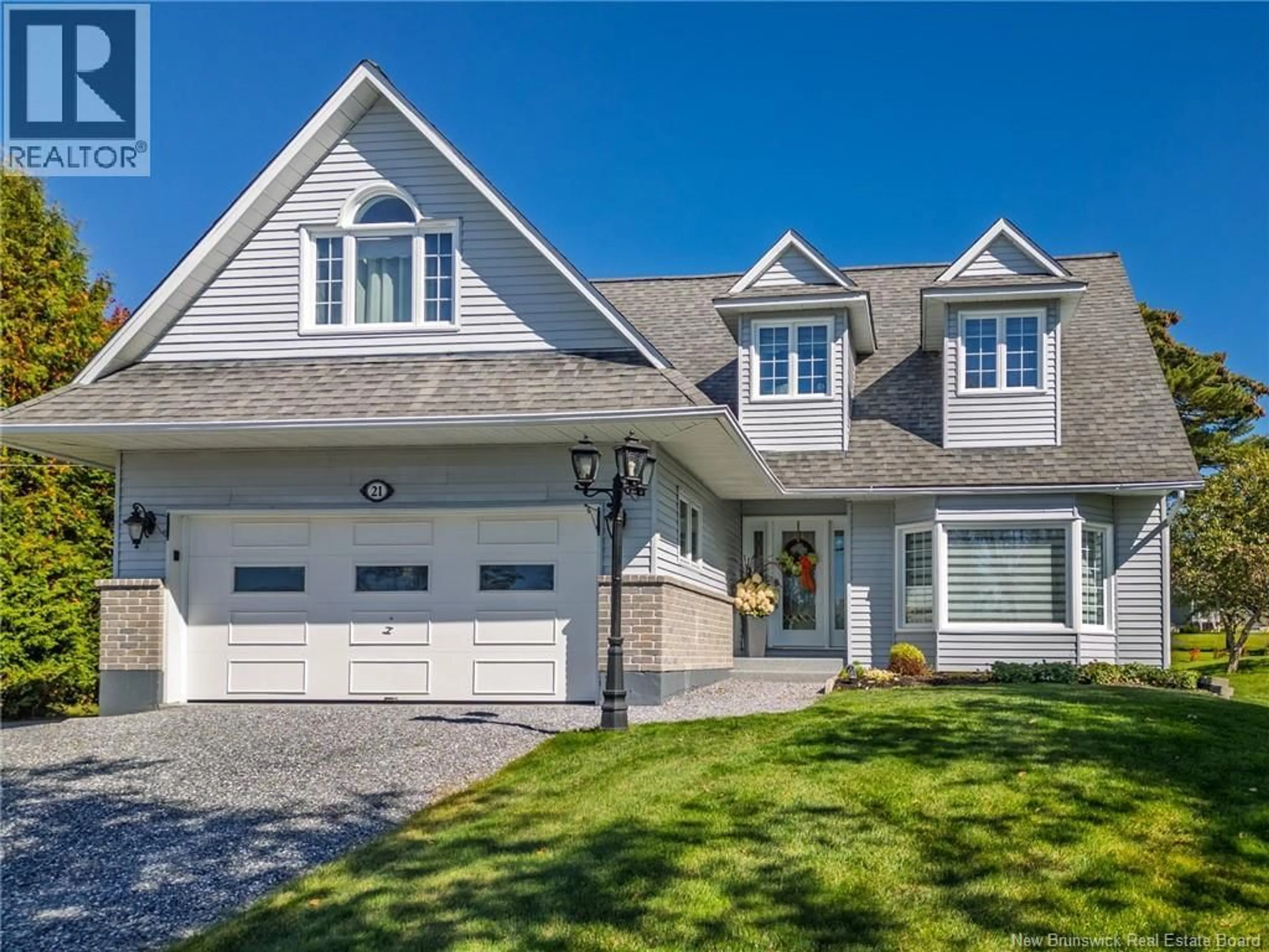 Home with vinyl exterior material, street for Unit# - 21 PRINCIPALE STREET, Rivière-Verte New Brunswick E7C2T3