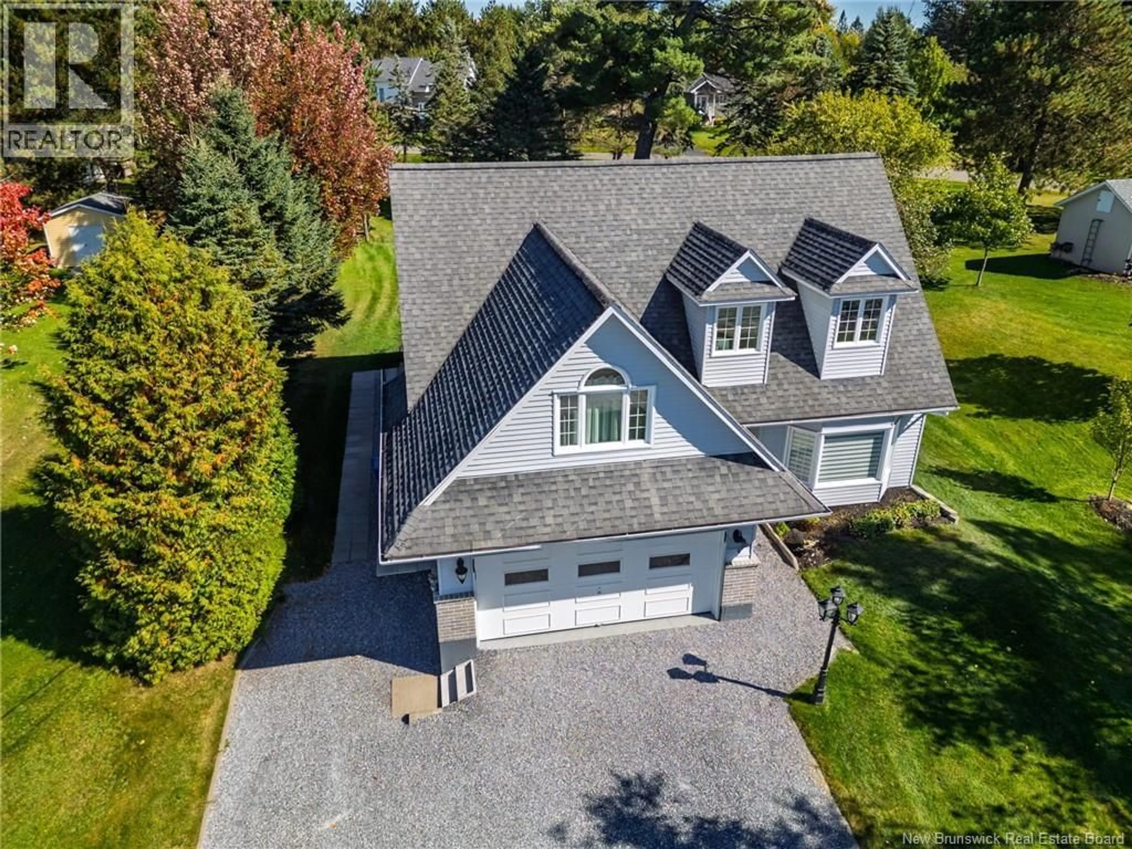 A pic from outside/outdoor area/front of a property/back of a property/a pic from drone, street for Unit# - 21 PRINCIPALE STREET, Rivière-Verte New Brunswick E7C2T3