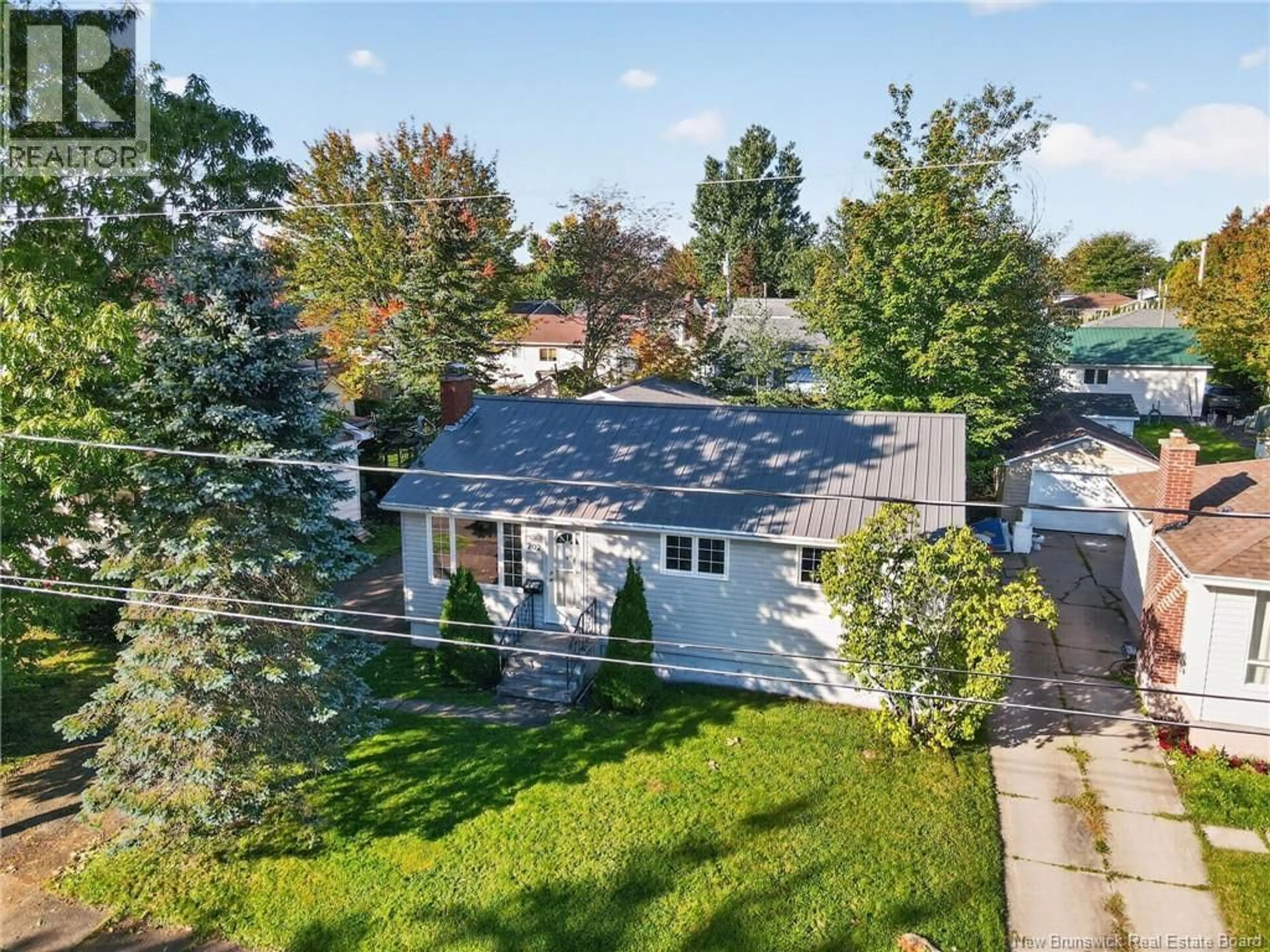 A pic from outside/outdoor area/front of a property/back of a property/a pic from drone, street for 202 MCKENZIE AVENUE, Moncton New Brunswick E1C7Z4