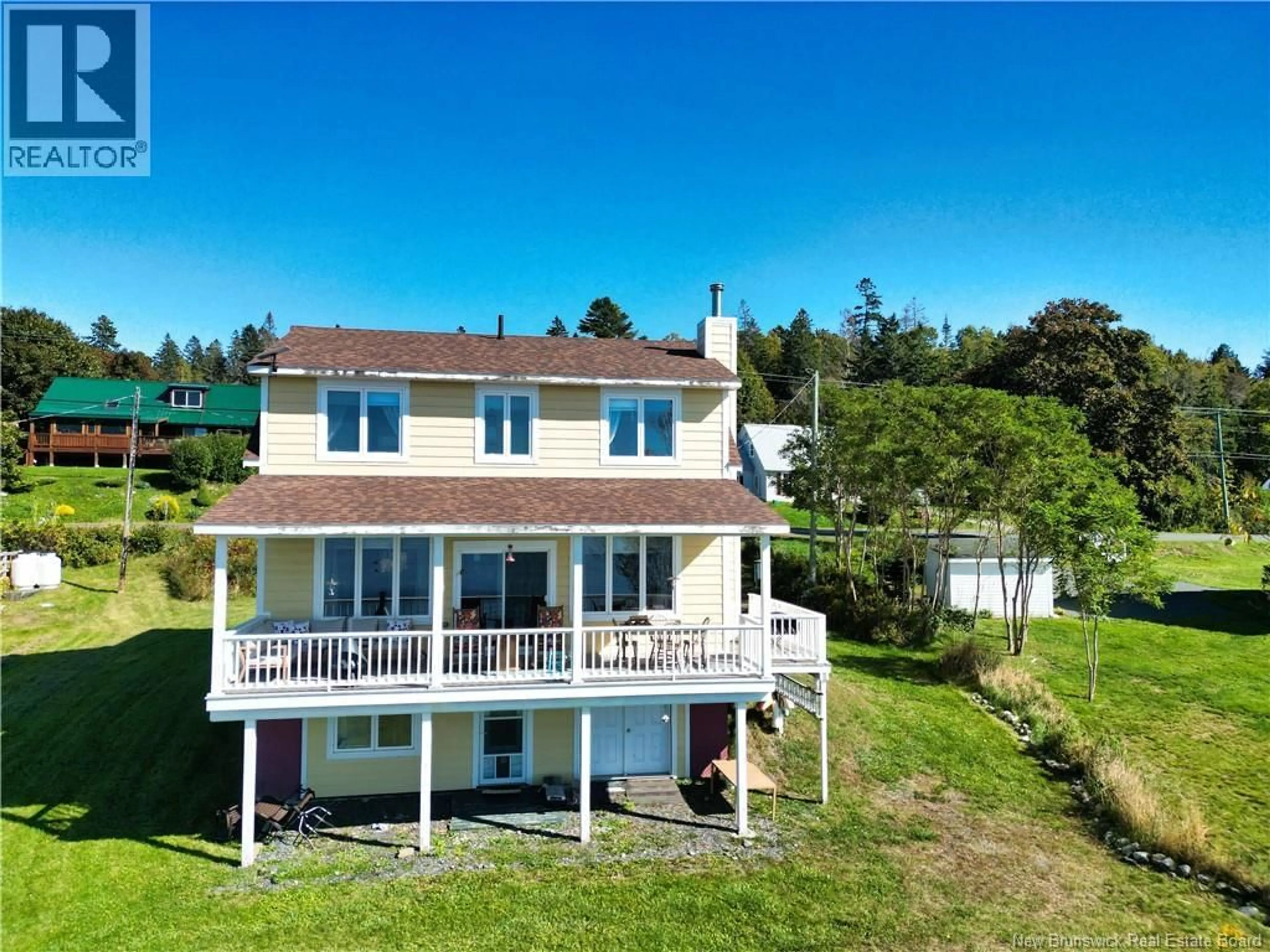 A pic from outside/outdoor area/front of a property/back of a property/a pic from drone, water/lake/river/ocean view for 225 NORTH ROAD, Welshpool New Brunswick E5E1C4