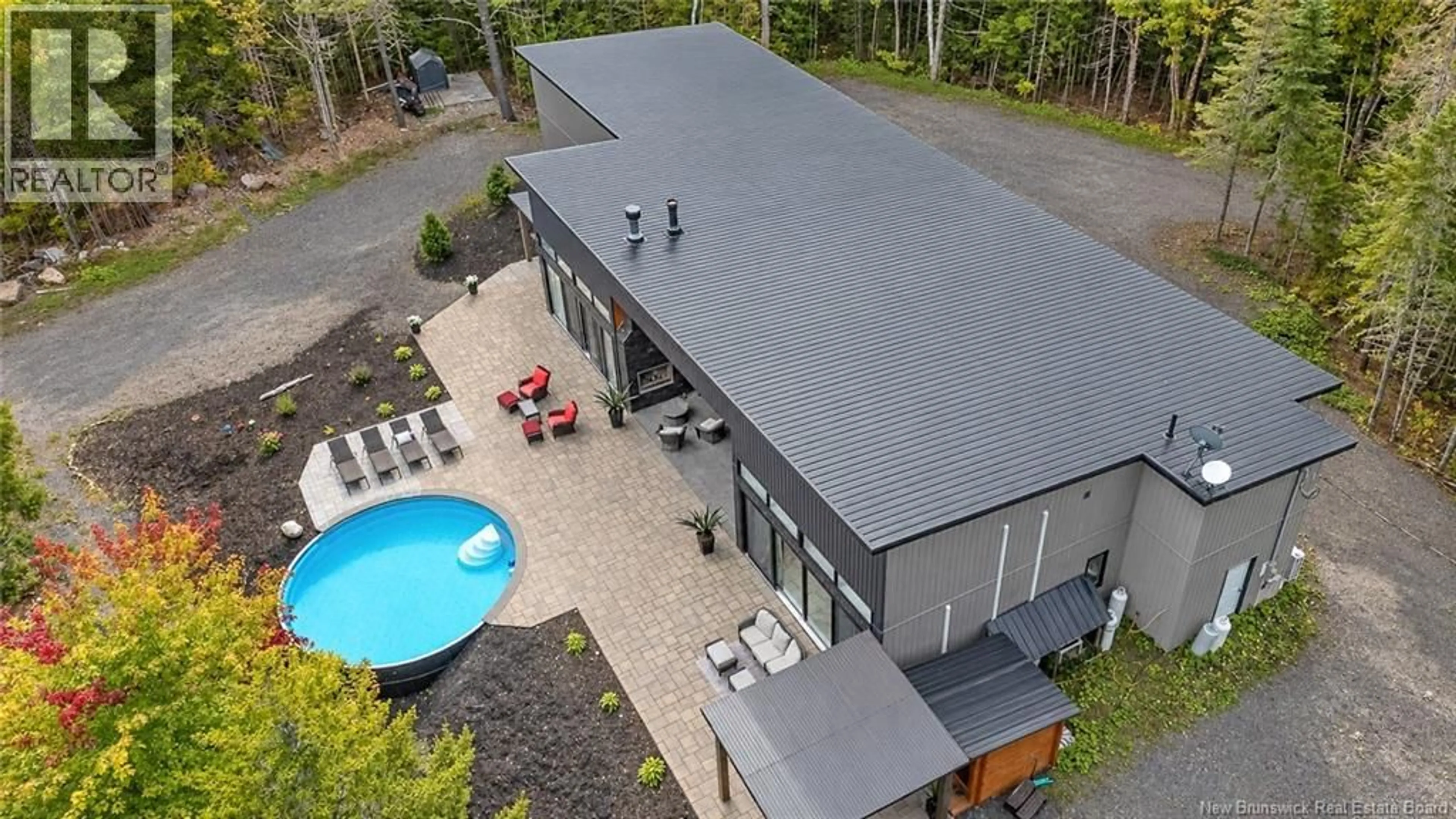 A pic from outside/outdoor area/front of a property/back of a property/a pic from drone, unknown for 55 CLEARBROOK DRIVE, Charters Settlement New Brunswick E3C1X9