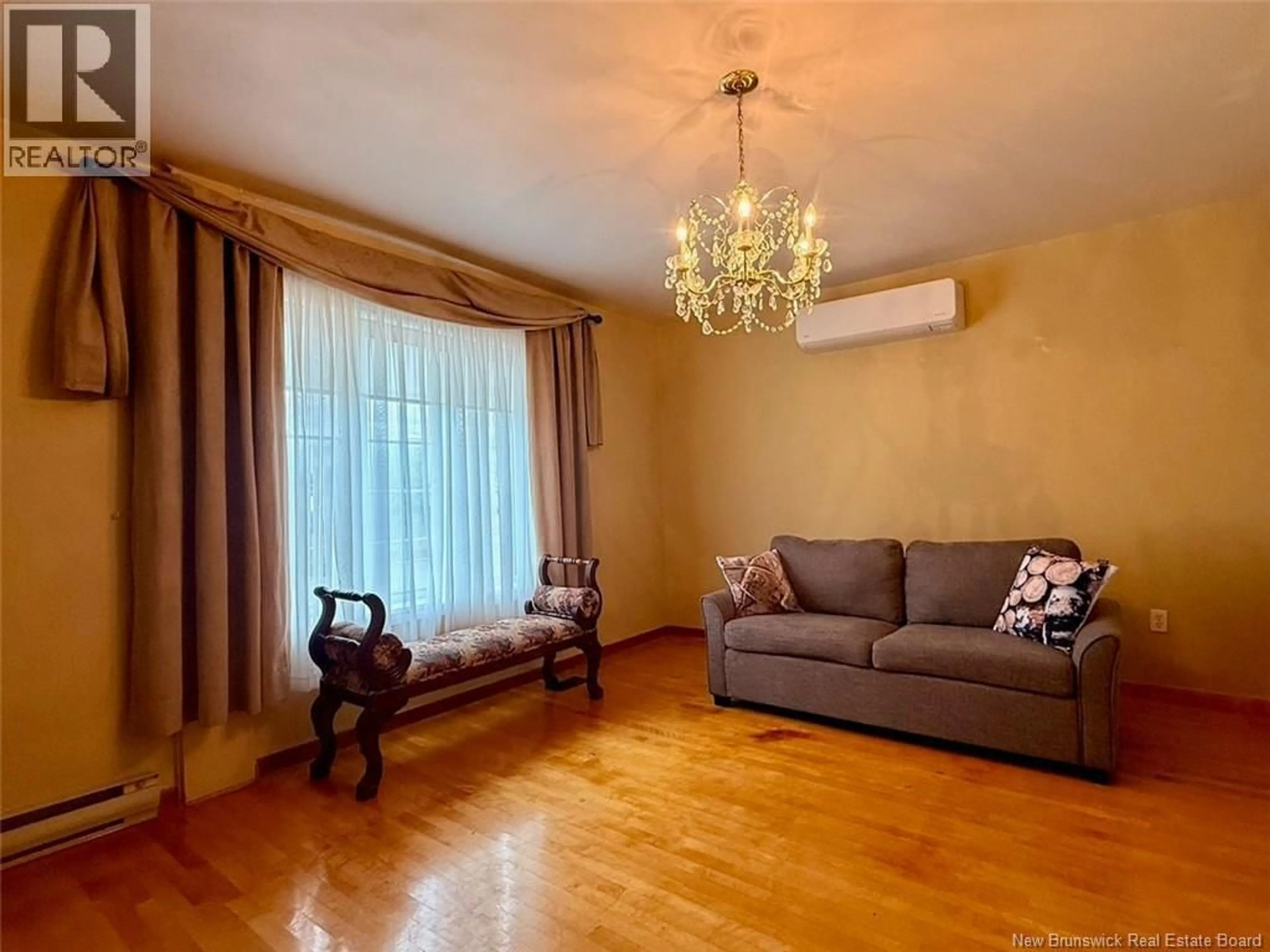 Living room with furniture, wood/laminate floor for 37 QUEEN STREET, Campbellton New Brunswick E3N1W9