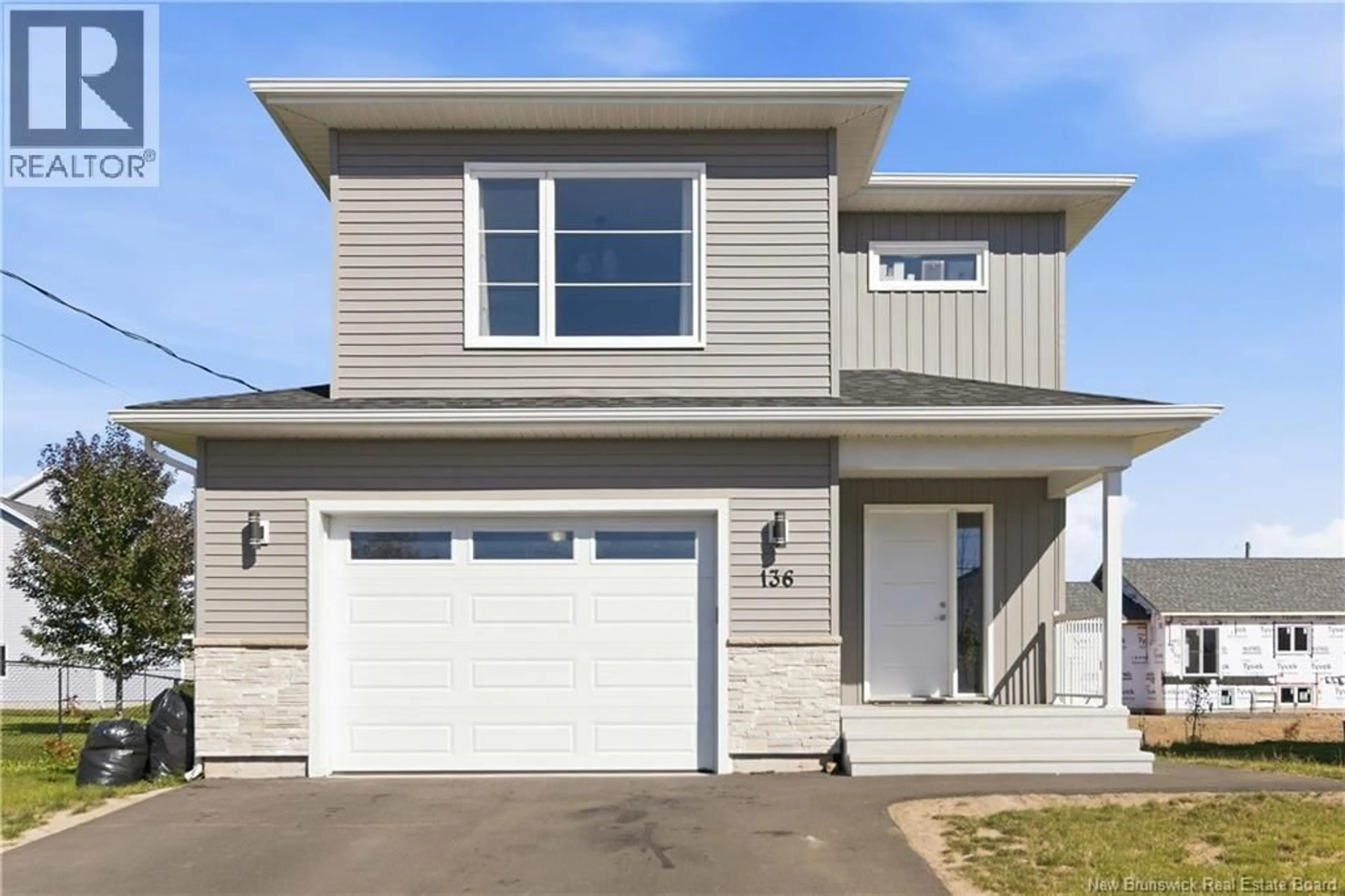 Home with vinyl exterior material, street for 136 RUNNEYMEADE ROAD, Riverview New Brunswick E1B0X5