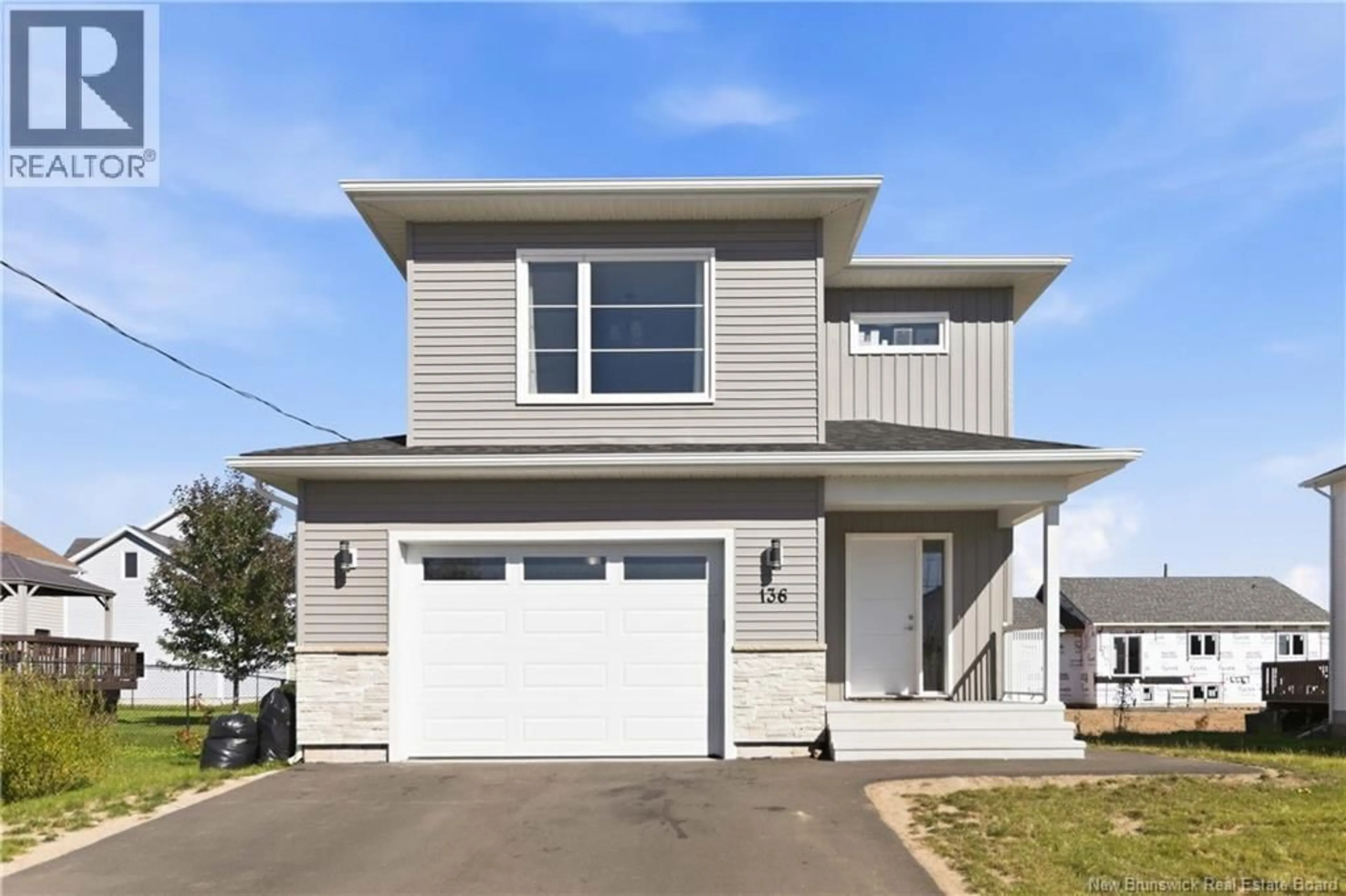 Home with vinyl exterior material, street for 136 RUNNEYMEADE ROAD, Riverview New Brunswick E1B0X5