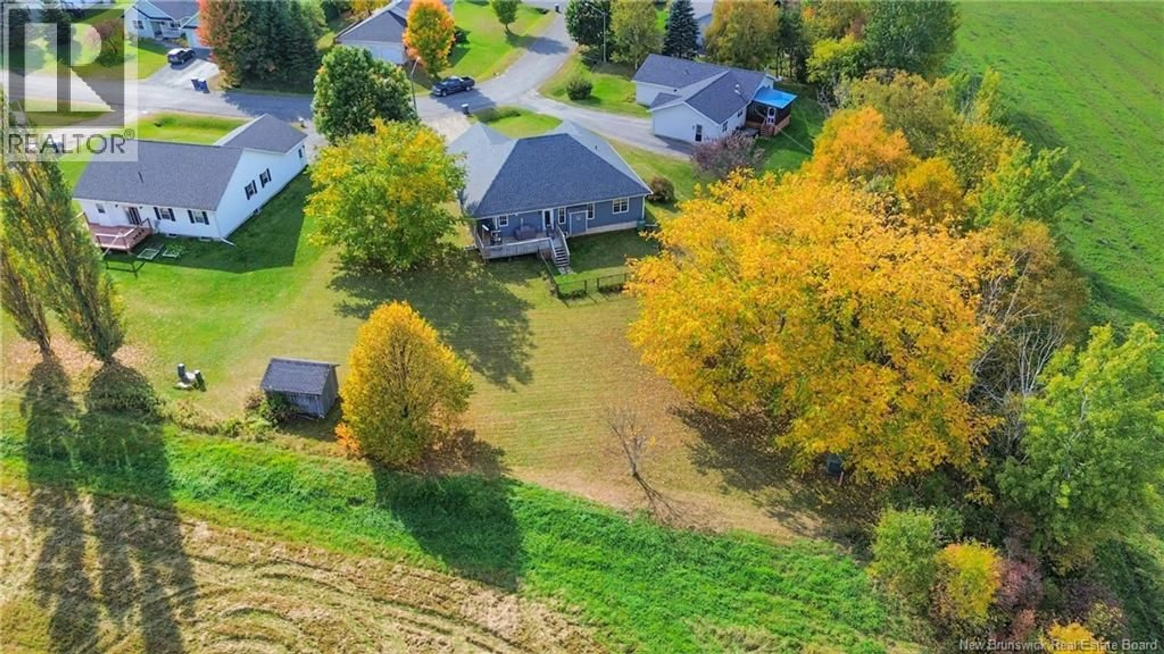 A pic from outside/outdoor area/front of a property/back of a property/a pic from drone, unknown for 19 SHEPODY CRESCENT, Florenceville-Bristol New Brunswick E7L2X5