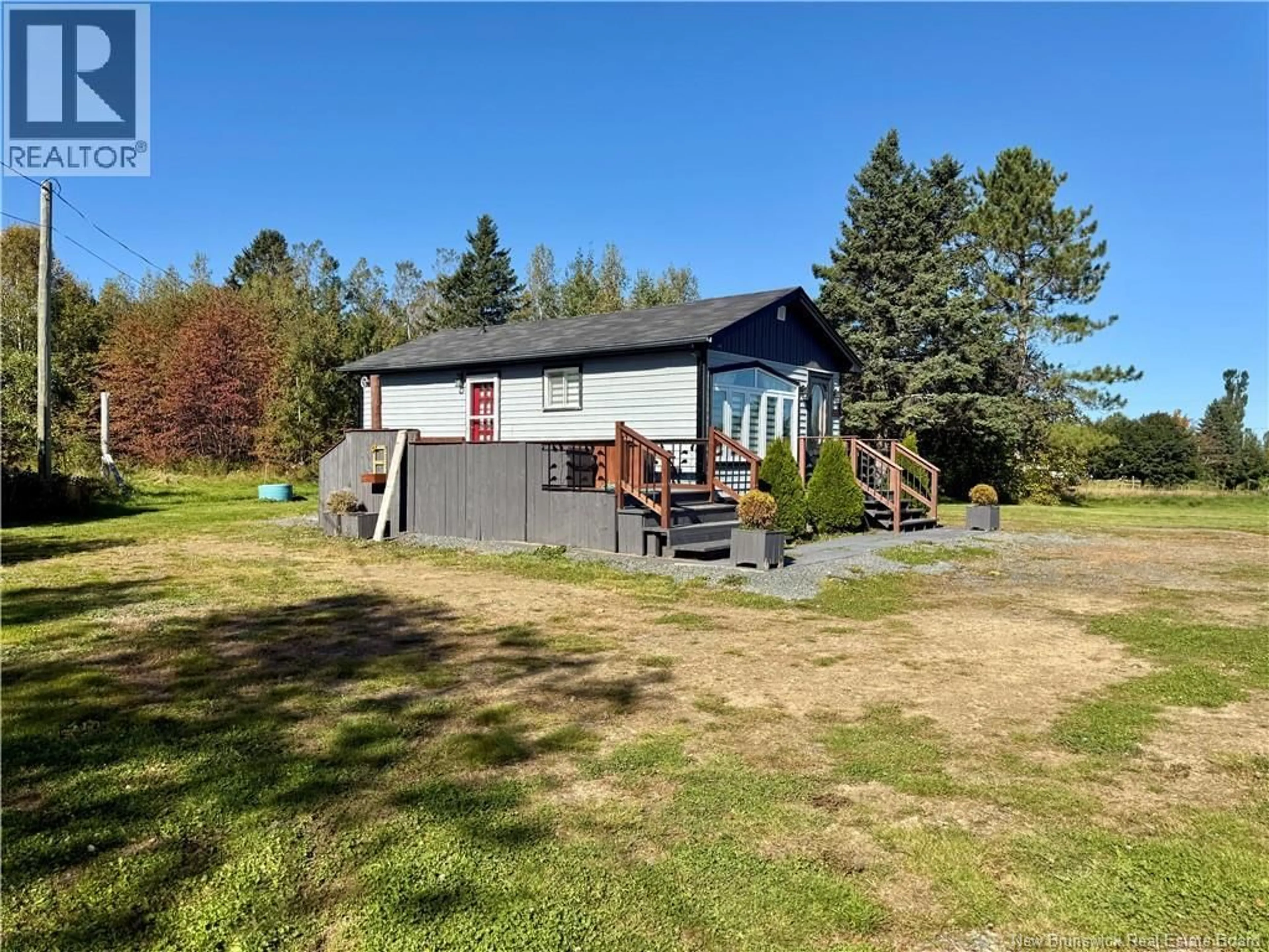 A pic from outside/outdoor area/front of a property/back of a property/a pic from drone, water/lake/river/ocean view for 525 ROUTE 135, Hacheyville New Brunswick E8M1J1