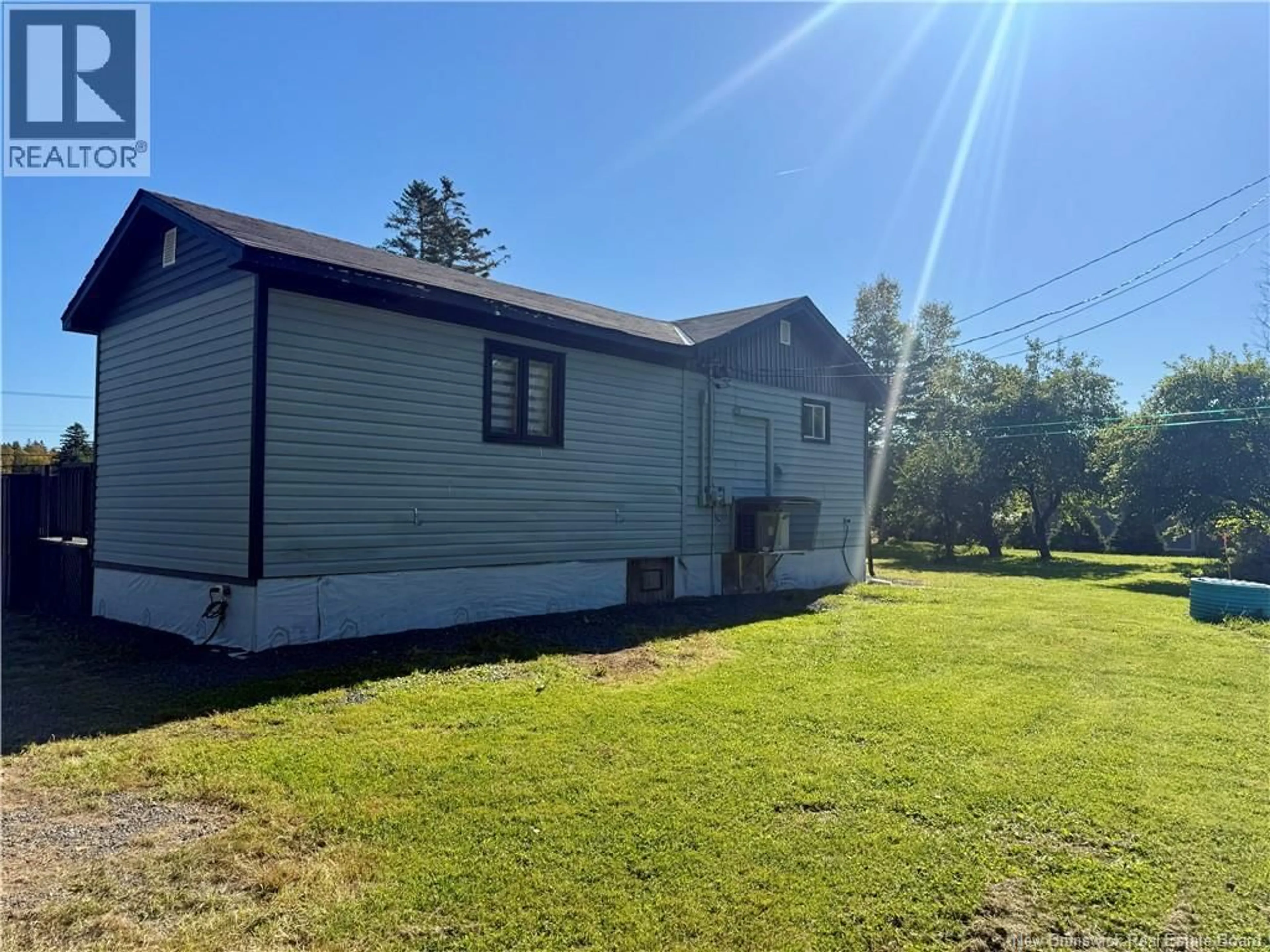 A pic from outside/outdoor area/front of a property/back of a property/a pic from drone, building for 525 ROUTE 135, Hacheyville New Brunswick E8M1J1