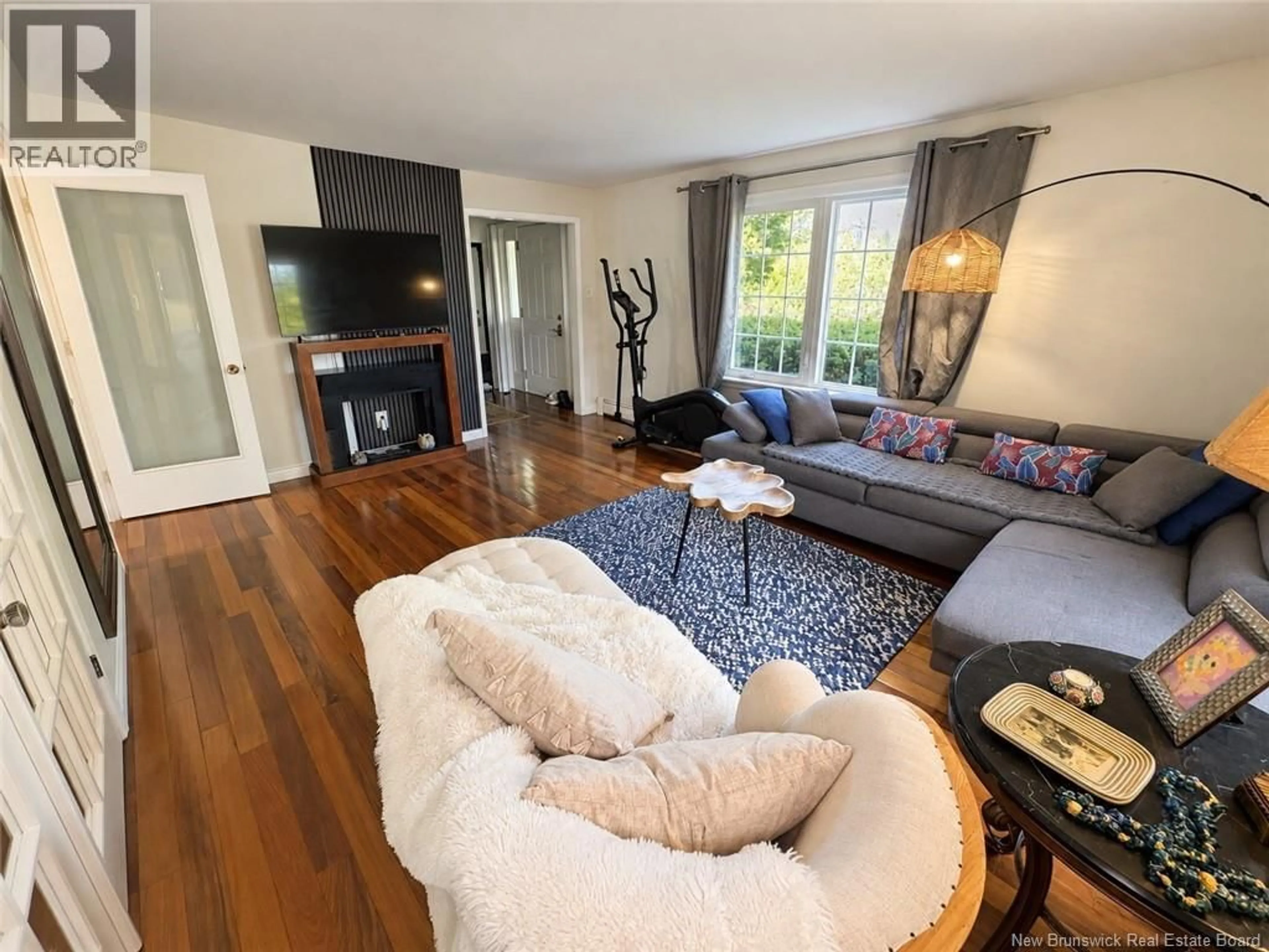 Living room with furniture, wood/laminate floor for 330 WESTMOUNT BOULEVARD, Moncton New Brunswick E1E1V6
