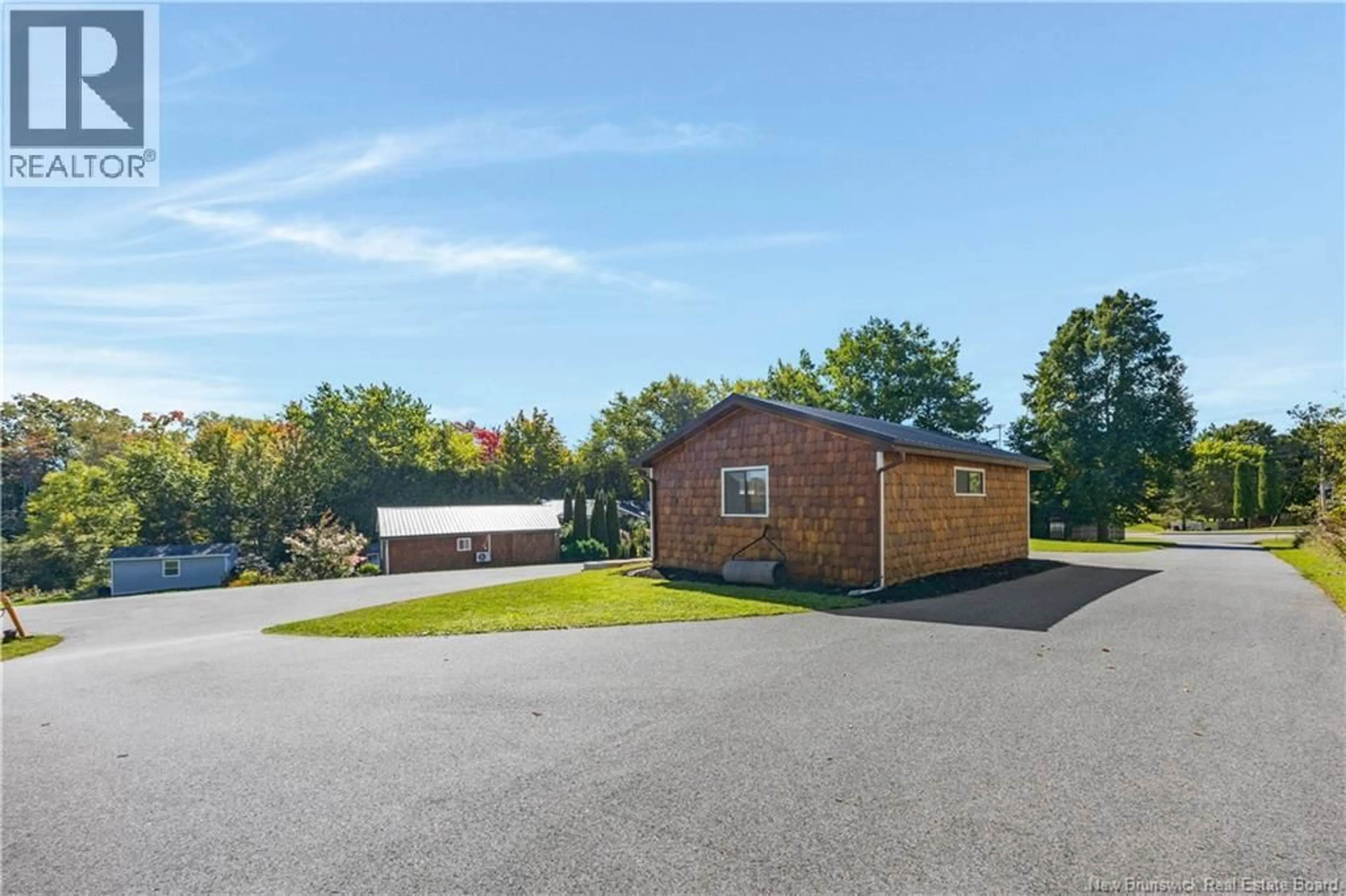 A pic from outside/outdoor area/front of a property/back of a property/a pic from drone, building for 932-936 MAIN STREET, Hampton New Brunswick E5N6E7