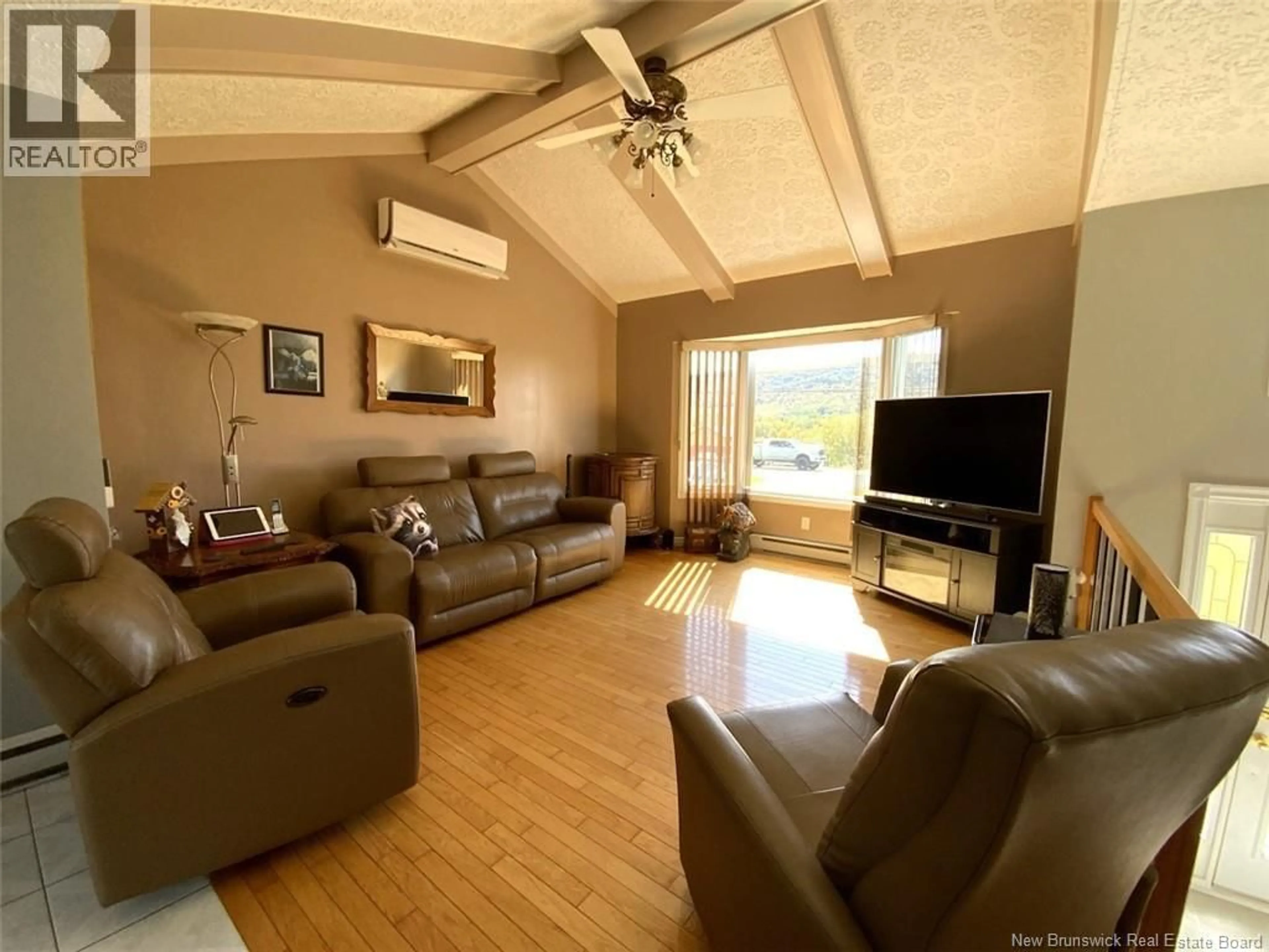 Living room with furniture, wood/laminate floor for 1617 ROUTE 205, Saint-François-de-Madawaska New Brunswick E7A1P7