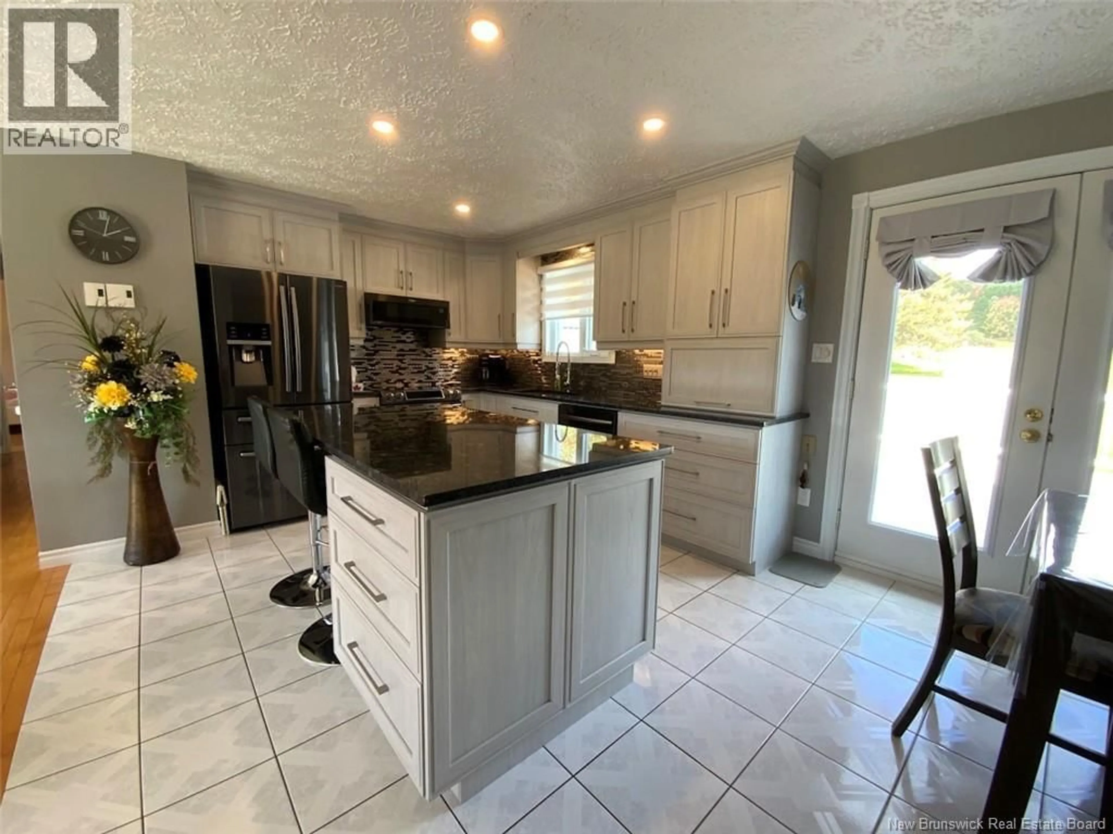 Open concept kitchen, ceramic/tile floor for 1617 ROUTE 205, Saint-François-de-Madawaska New Brunswick E7A1P7
