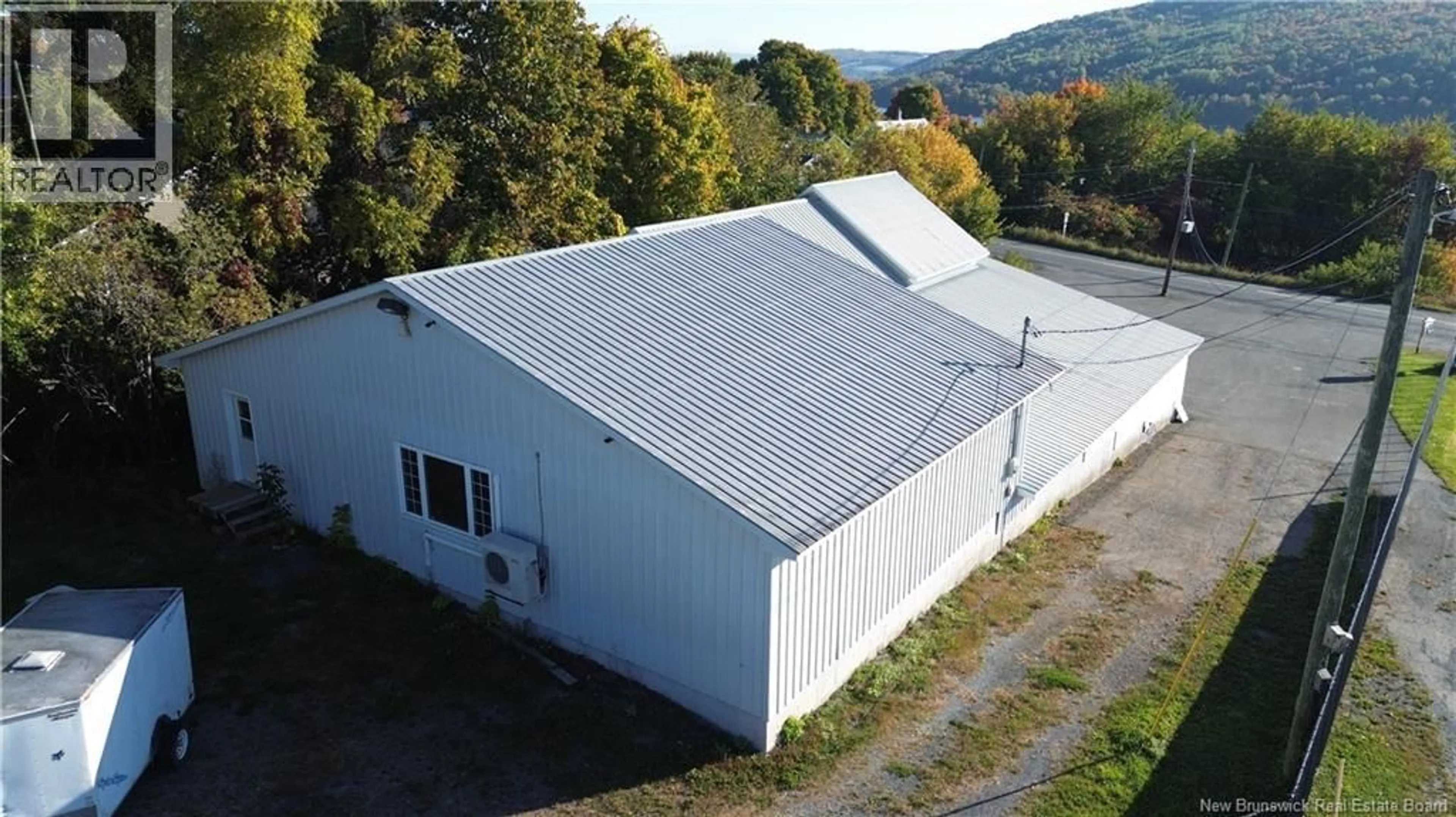 A pic from outside/outdoor area/front of a property/back of a property/a pic from drone, building for 1061 103 ROUTE ROUTE, Woodstock New Brunswick E7M3C4
