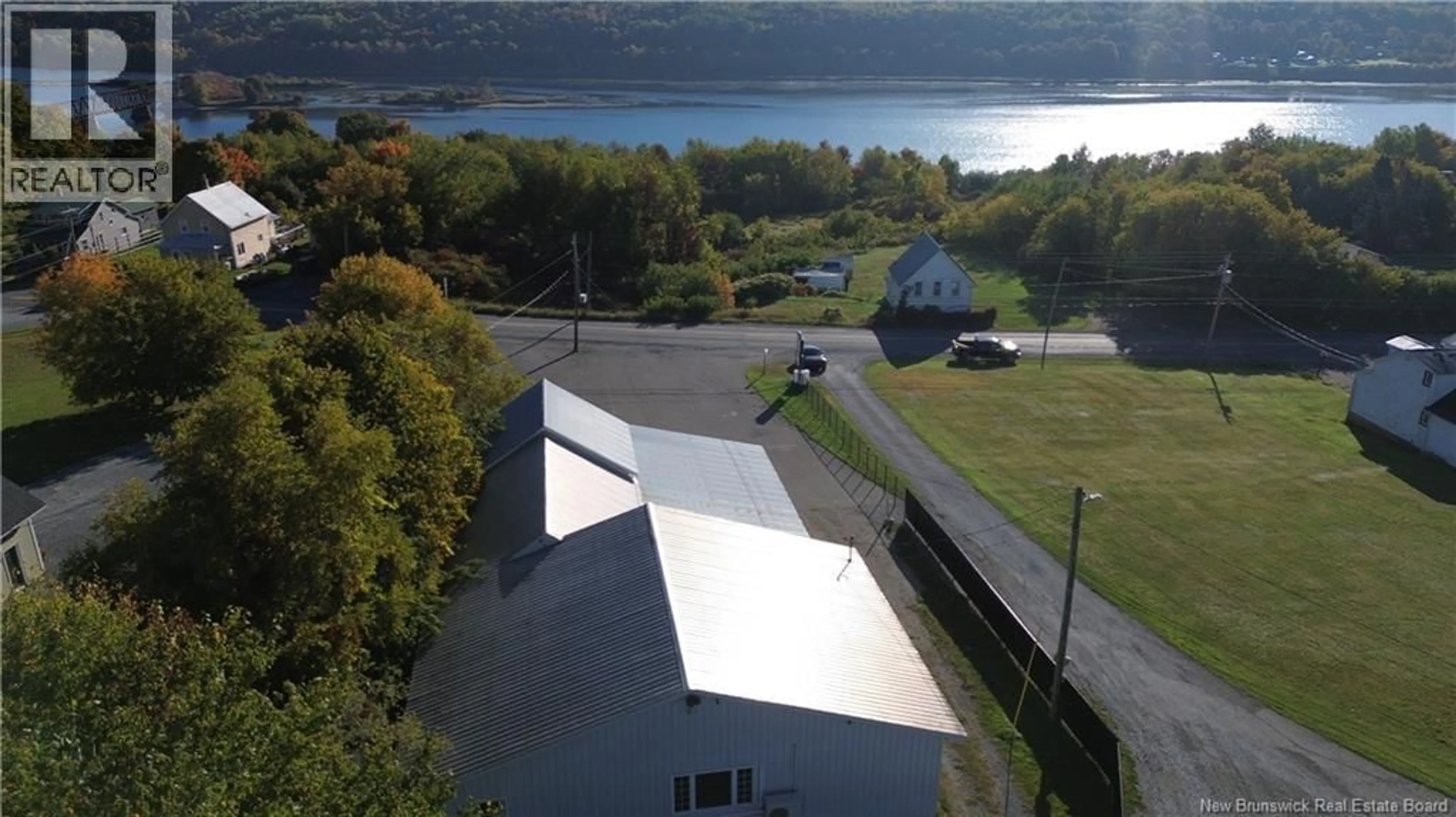 A pic from outside/outdoor area/front of a property/back of a property/a pic from drone, water/lake/river/ocean view for 1061 103 ROUTE ROUTE, Woodstock New Brunswick E7M3C4