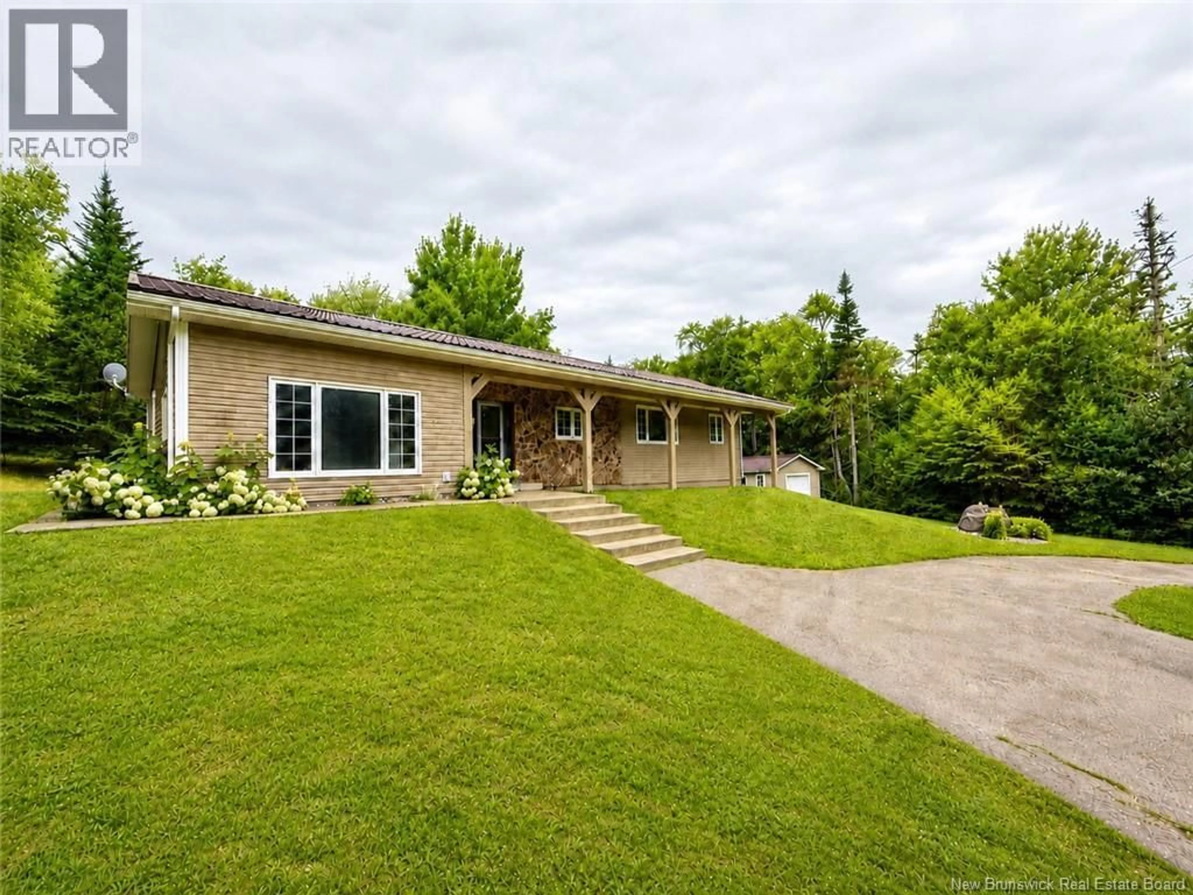 A pic from outside/outdoor area/front of a property/back of a property/a pic from drone, street for 2382 ROUTE 490, Ammon New Brunswick E1G4R8