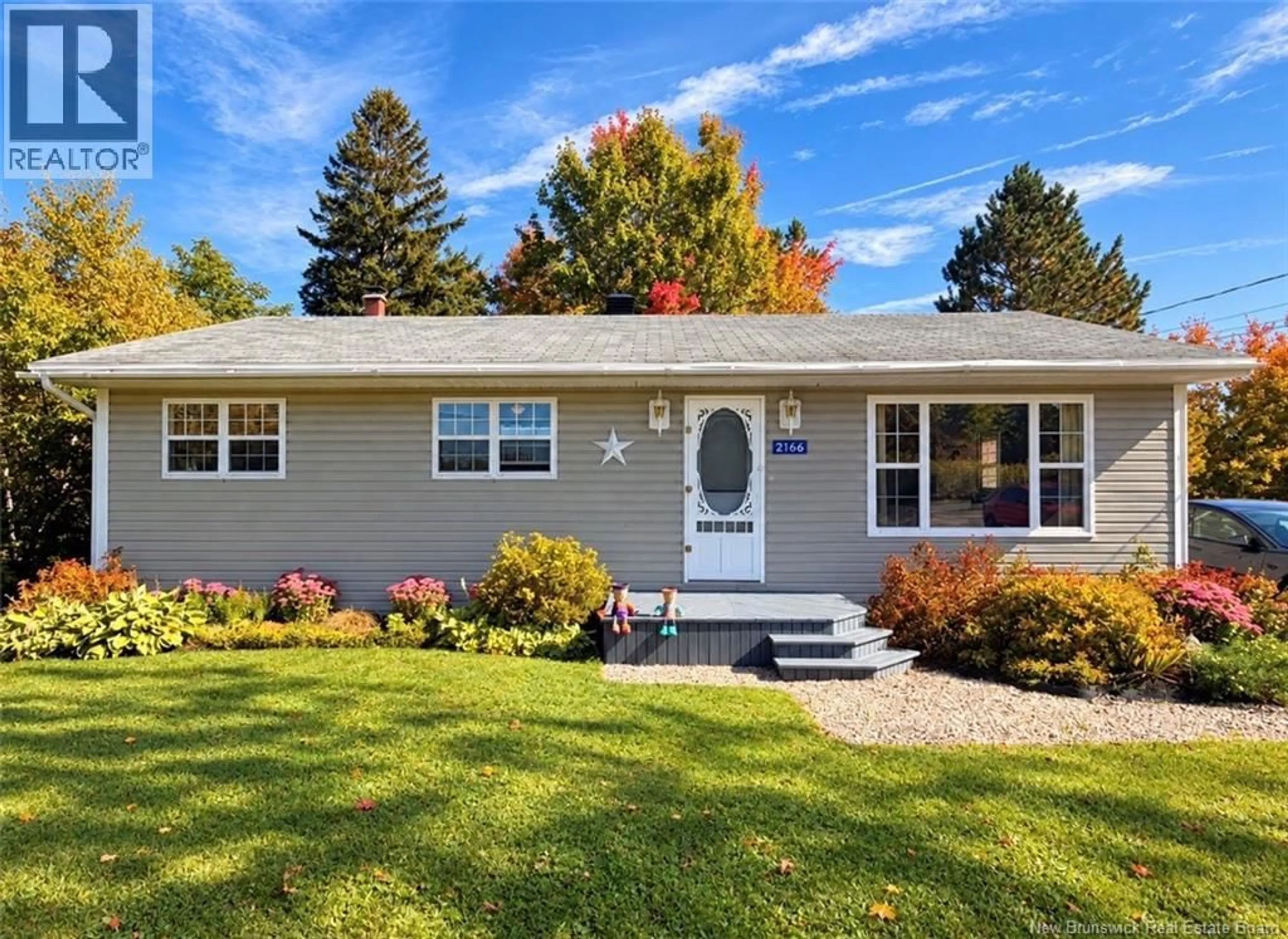 Home with vinyl exterior material, street for 2166 CARRON, Bathurst New Brunswick E2A6A1