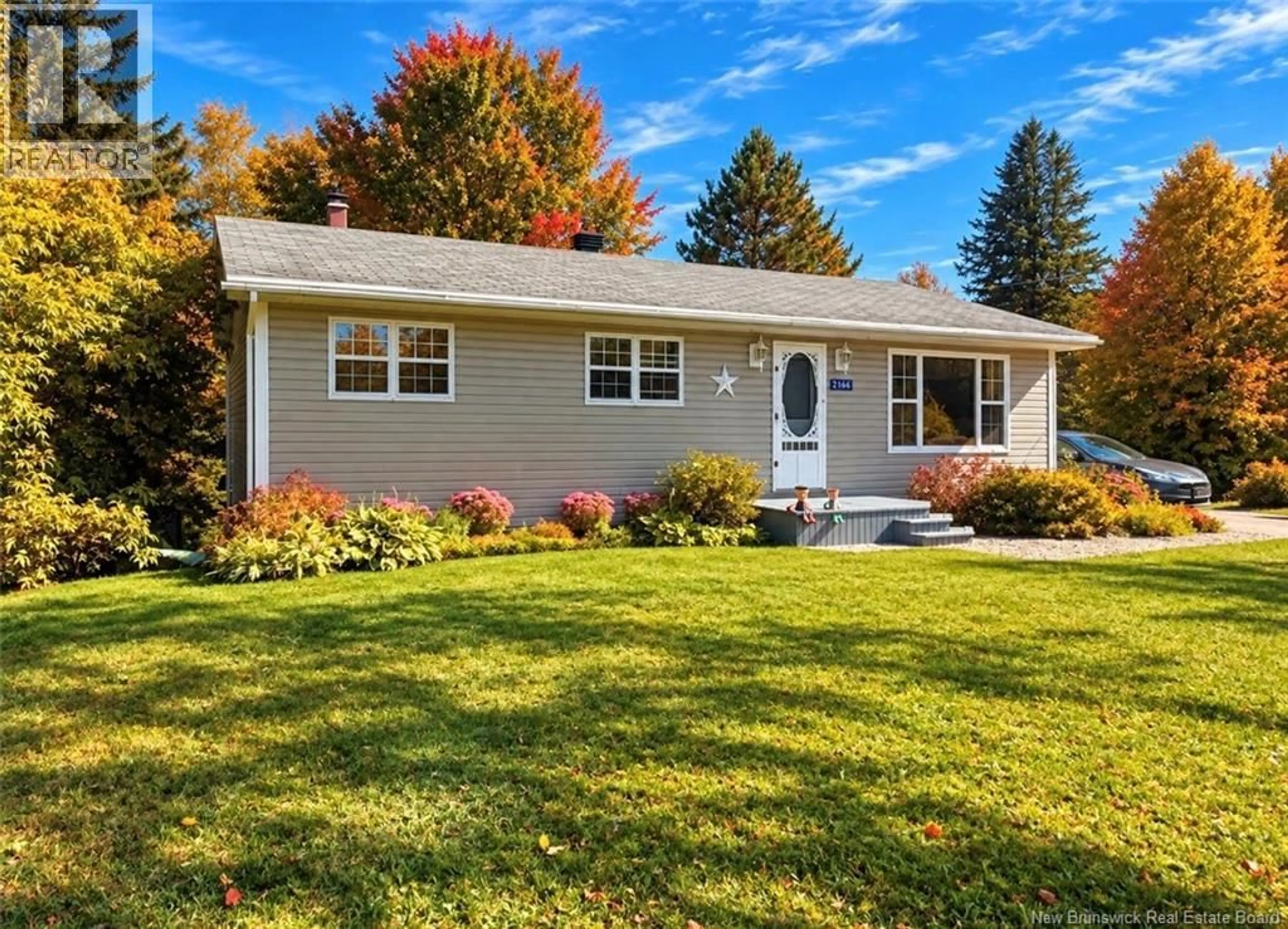 Home with vinyl exterior material, street for 2166 CARRON, Bathurst New Brunswick E2A6A1