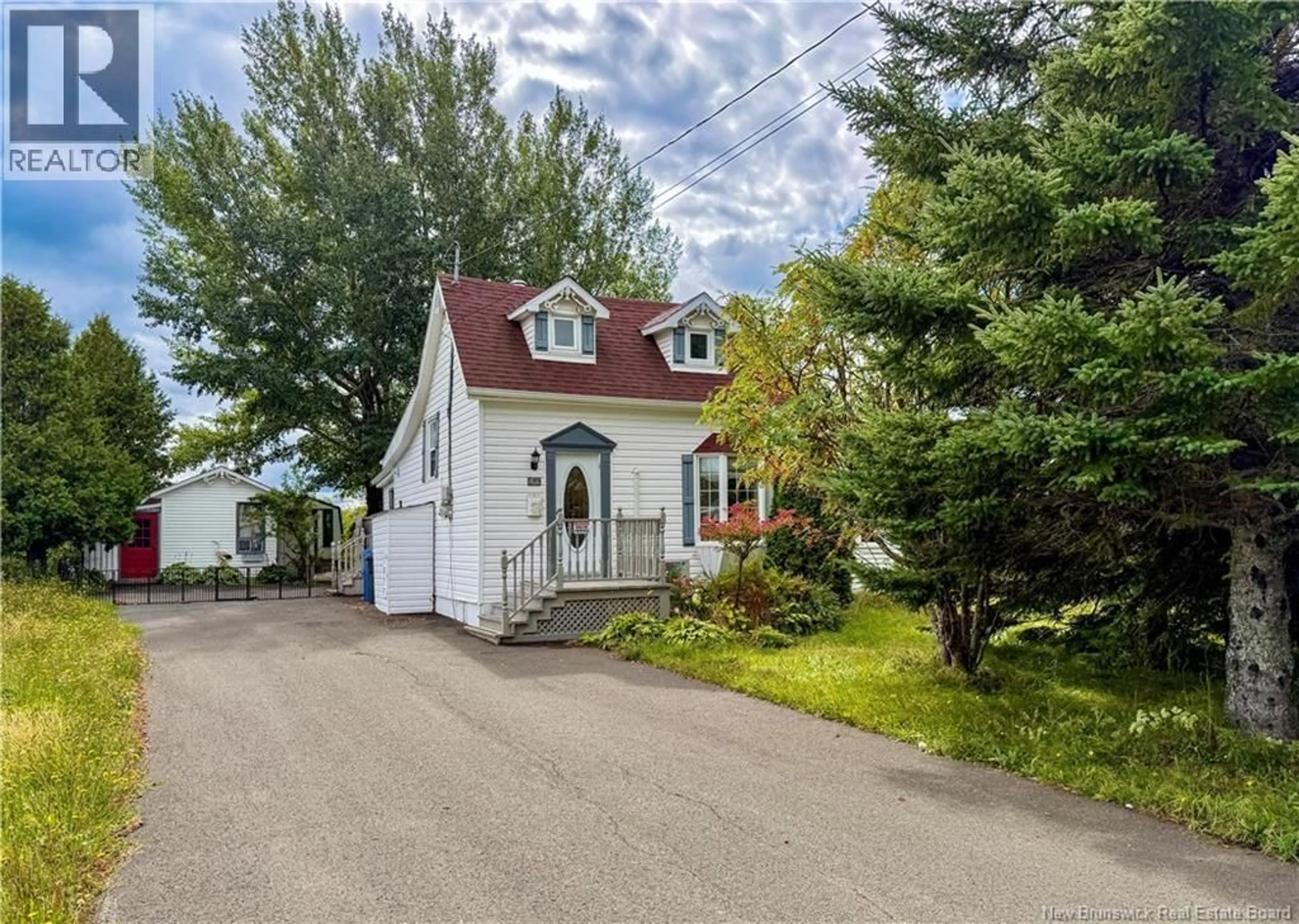 Home with vinyl exterior material, street for 42 L'ANSE STREET, Eel River Crossing New Brunswick E8E1R4