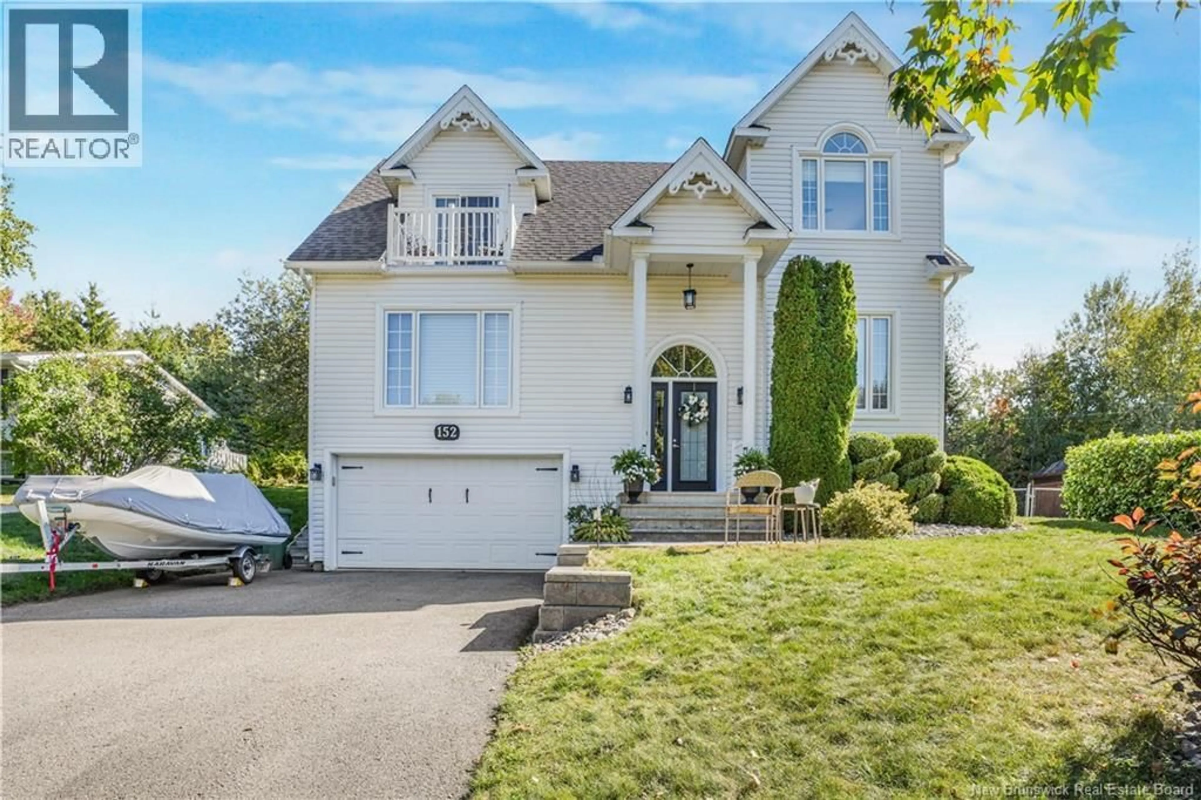Home with vinyl exterior material, street for 152 WIGGINS DRIVE, Fredericton New Brunswick E3A5N7