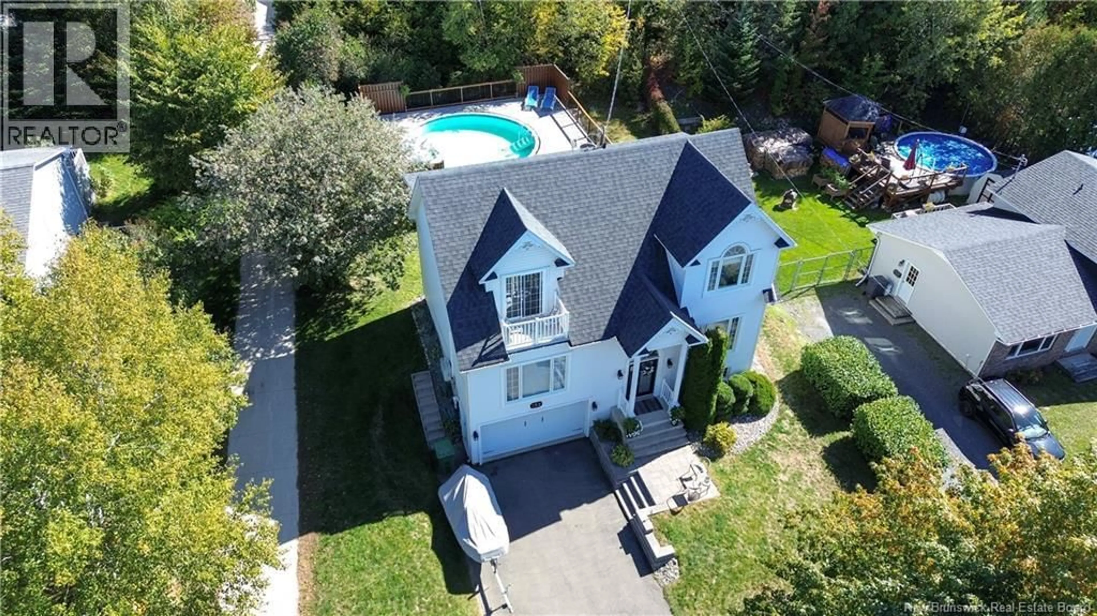 A pic from outside/outdoor area/front of a property/back of a property/a pic from drone, street for 152 WIGGINS DRIVE, Fredericton New Brunswick E3A5N7