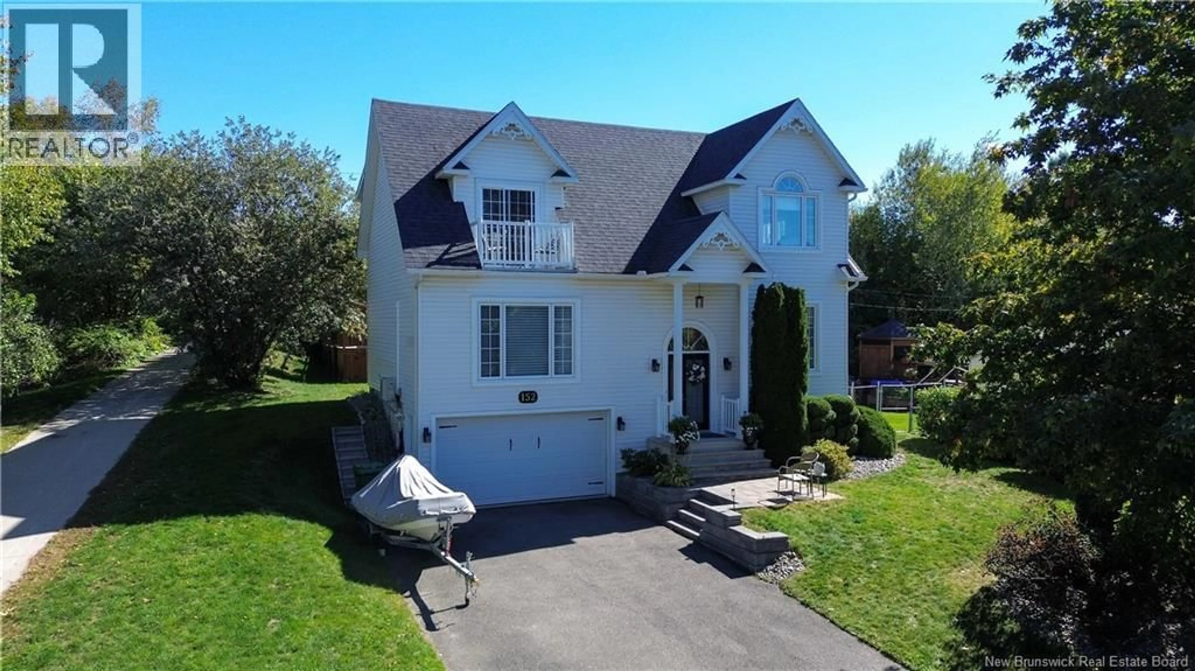 A pic from outside/outdoor area/front of a property/back of a property/a pic from drone, street for 152 WIGGINS DRIVE, Fredericton New Brunswick E3A5N7