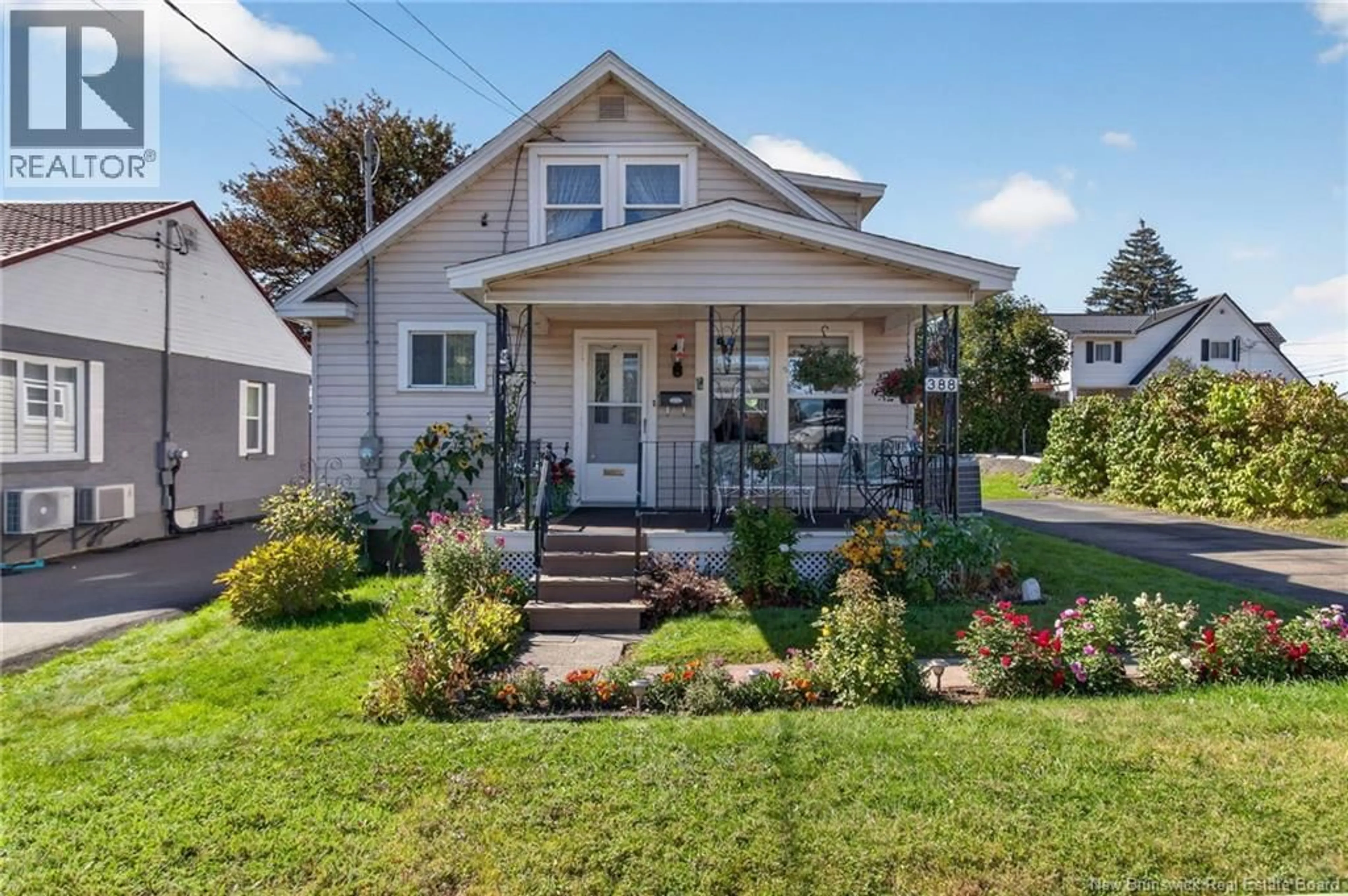 Home with vinyl exterior material, street for 388 BEAUSEJOUR, Dieppe New Brunswick E1A1Y6