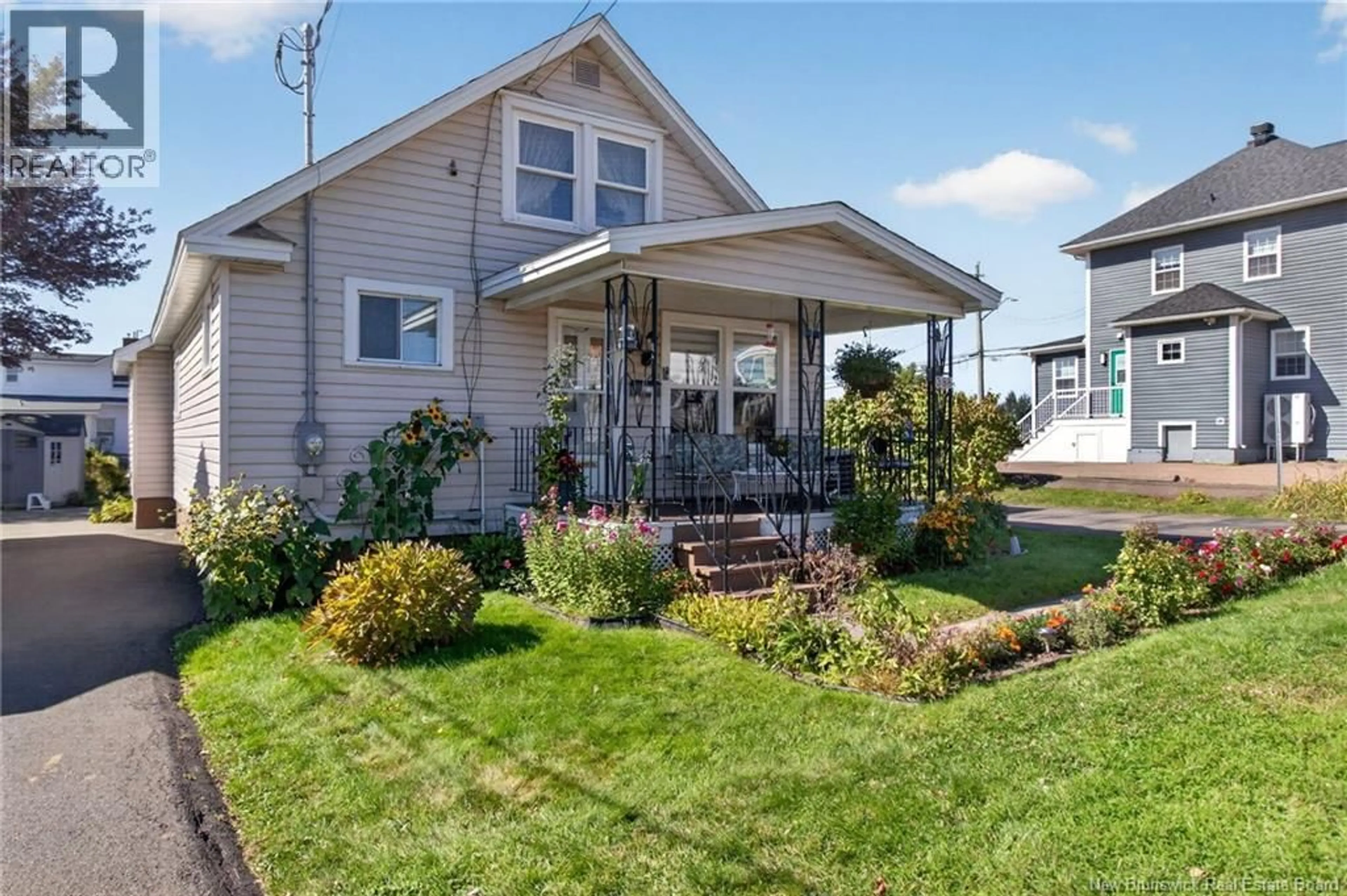Home with vinyl exterior material, street for 388 BEAUSEJOUR, Dieppe New Brunswick E1A1Y6