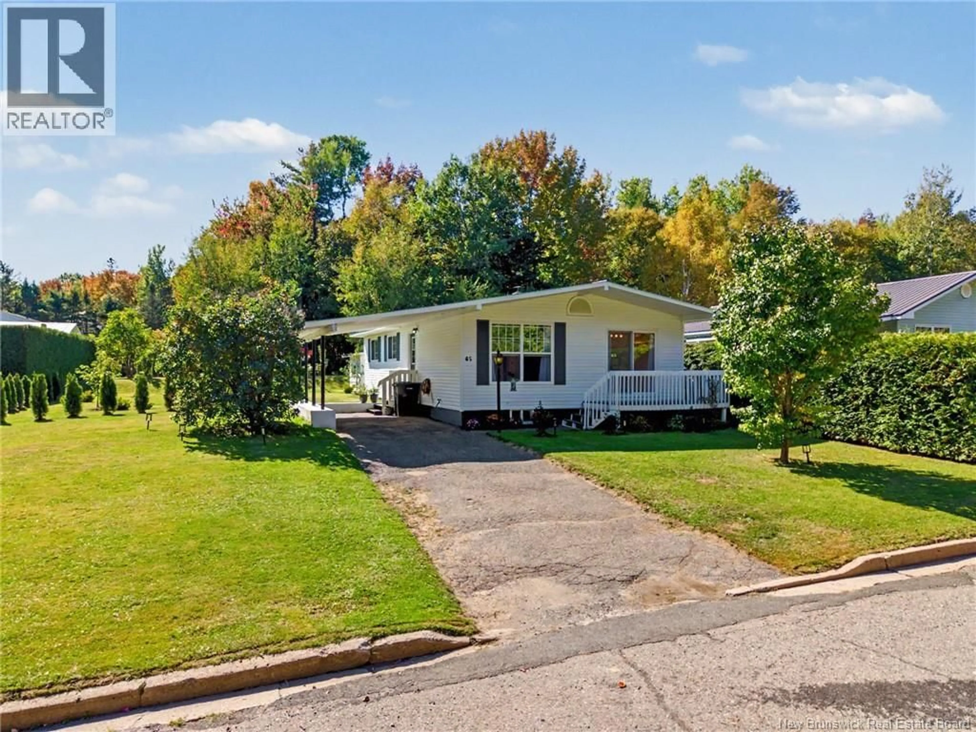 Home with vinyl exterior material, street for 65 MCNAIR DRIVE, Nackawic New Brunswick E6G1A4