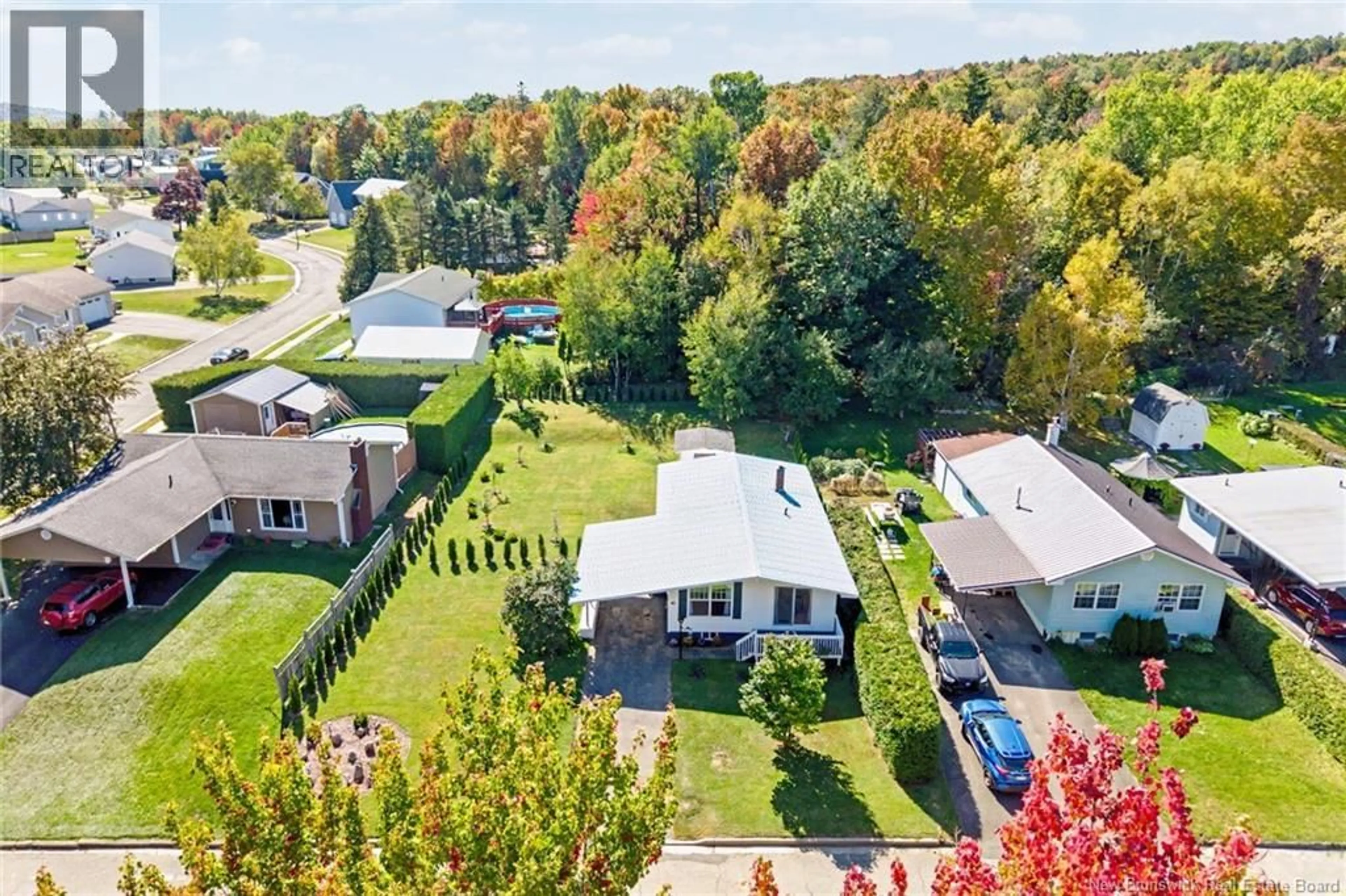 A pic from outside/outdoor area/front of a property/back of a property/a pic from drone, unknown for 65 MCNAIR DRIVE, Nackawic New Brunswick E6G1A4