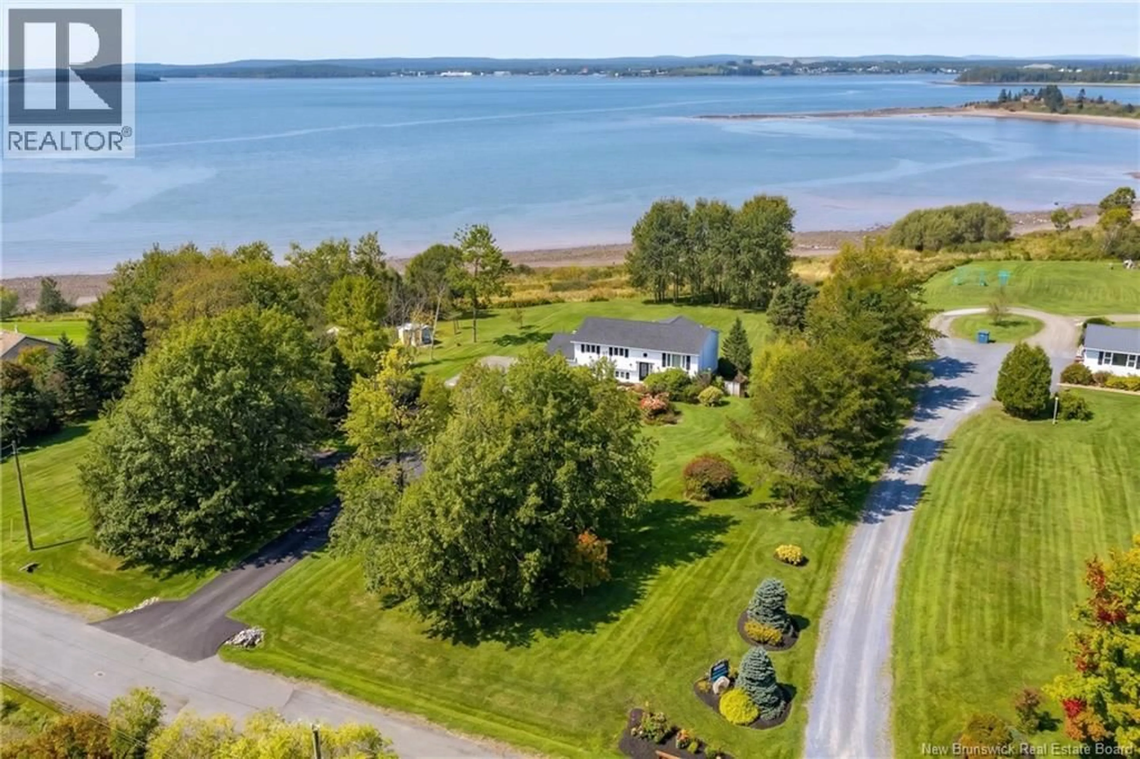 A pic from outside/outdoor area/front of a property/back of a property/a pic from drone, water/lake/river/ocean view for 75 ANTHONY'S COVE ROAD, Saint John New Brunswick E2P1K9