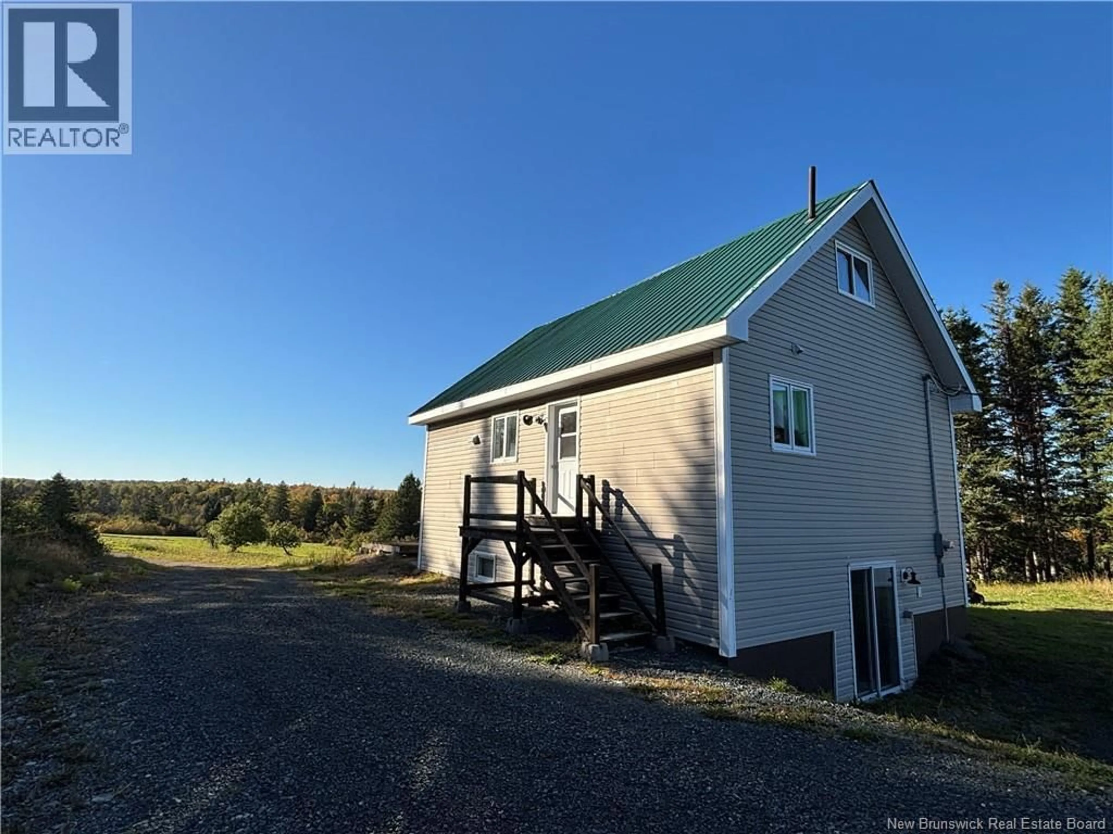 A pic from outside/outdoor area/front of a property/back of a property/a pic from drone, unknown for 1510 CH. LUGAR, Lugar New Brunswick E8K3B4