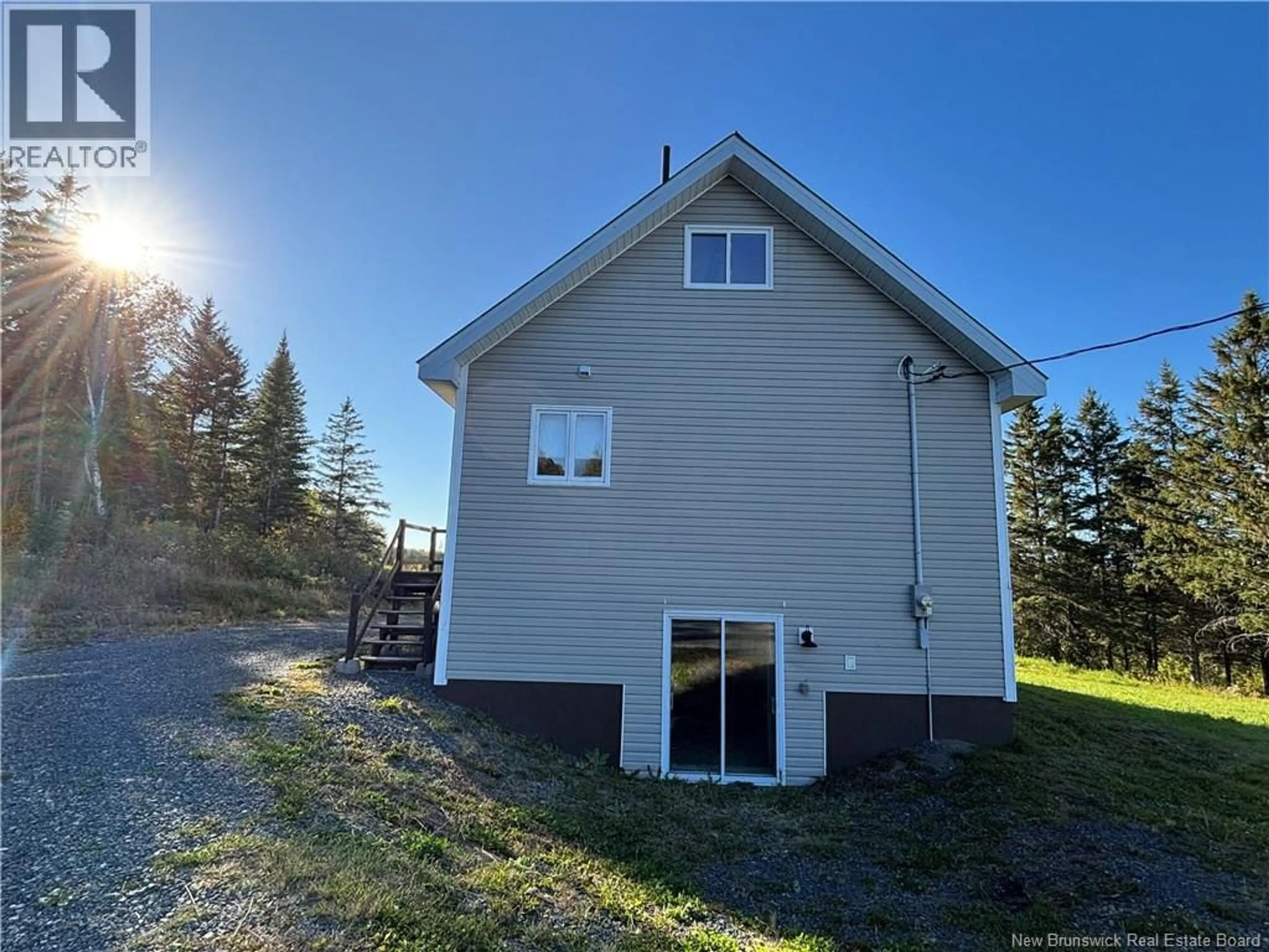 A pic from outside/outdoor area/front of a property/back of a property/a pic from drone, unknown for 1510 CH. LUGAR, Lugar New Brunswick E8K3B4