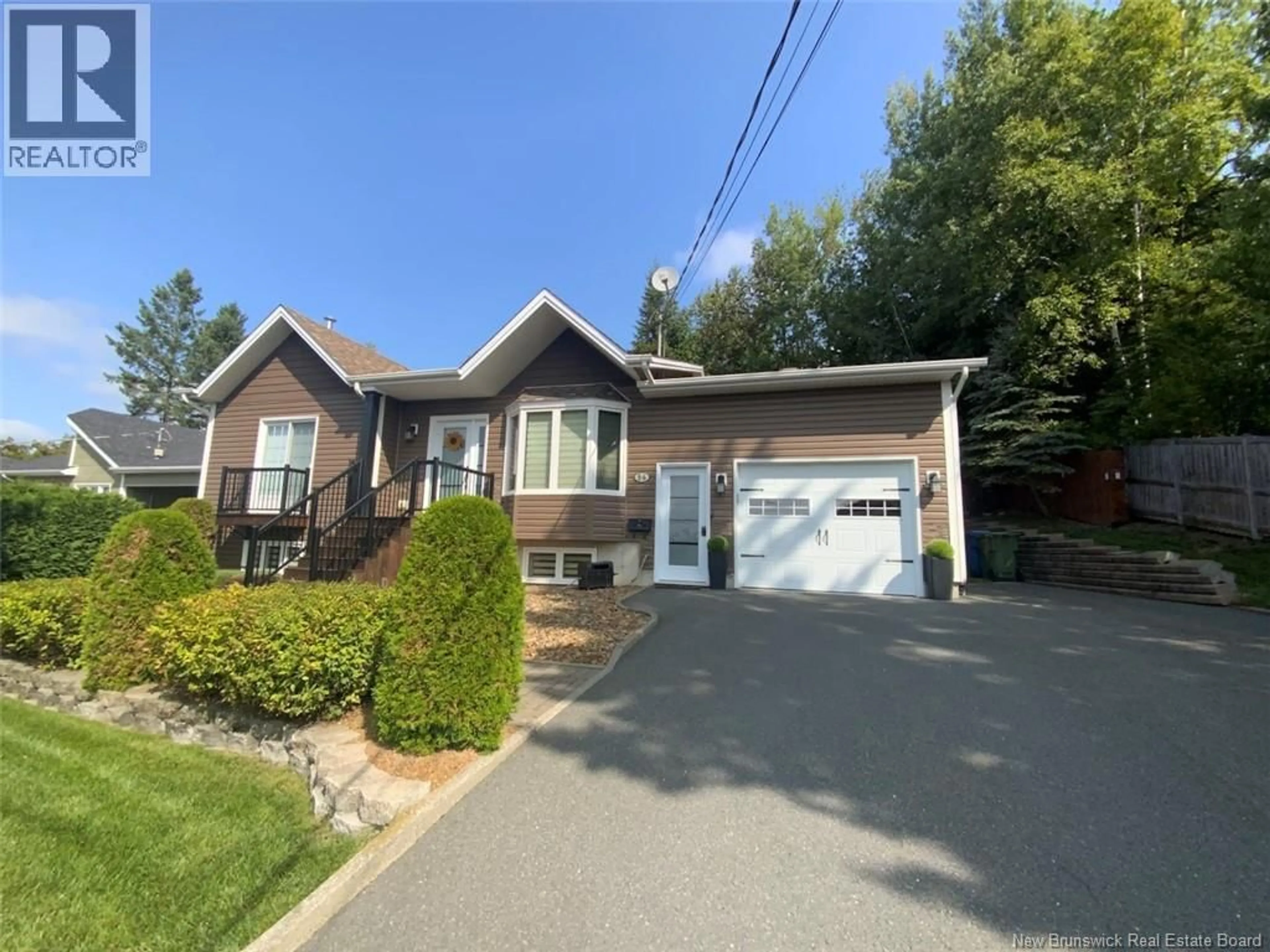 Home with vinyl exterior material, street for 56 DES GOUVERNEURS STREET, Edmundston New Brunswick E3V4H5