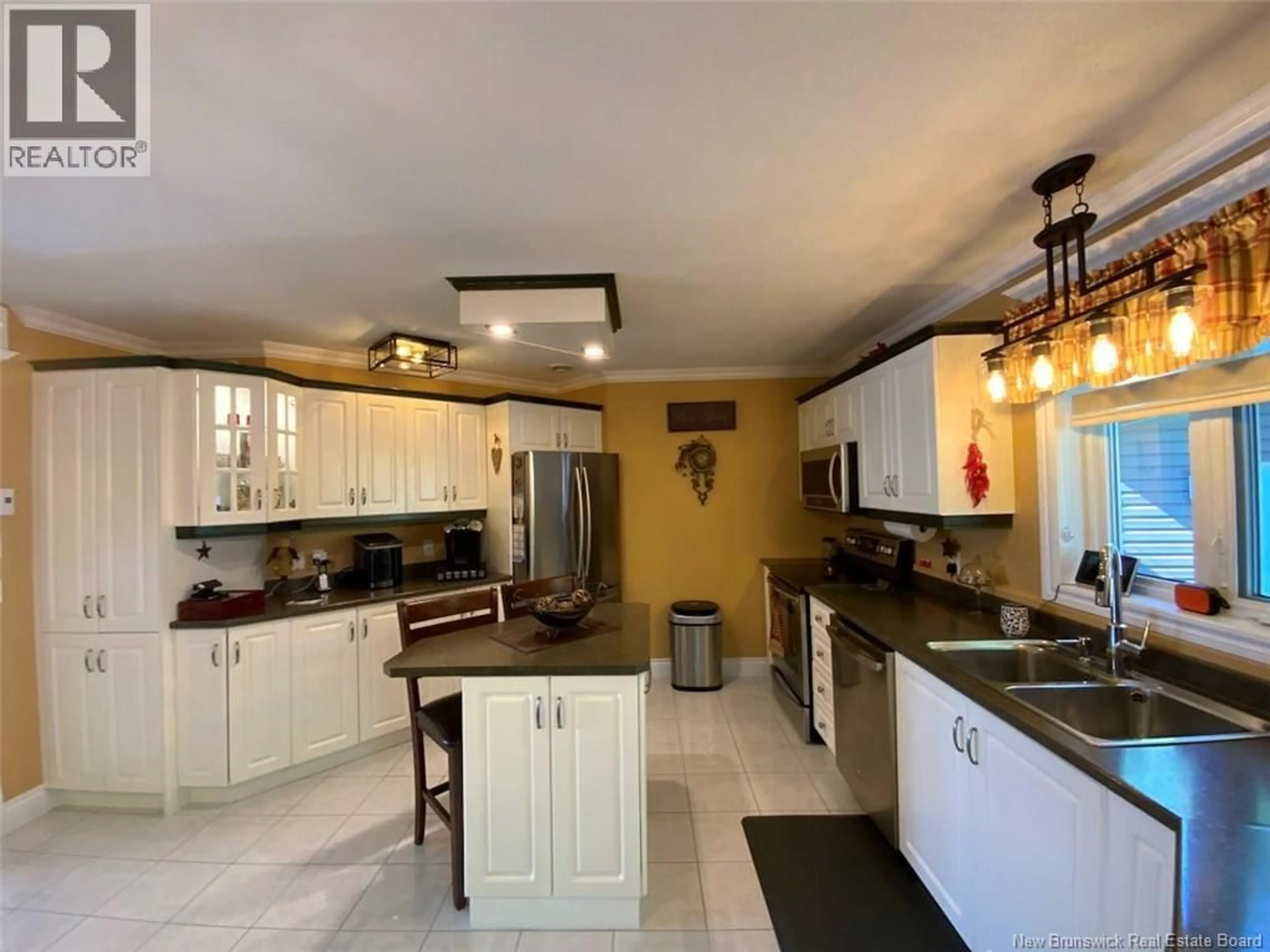 Open concept kitchen, ceramic/tile floor for 56 DES GOUVERNEURS STREET, Edmundston New Brunswick E3V4H5