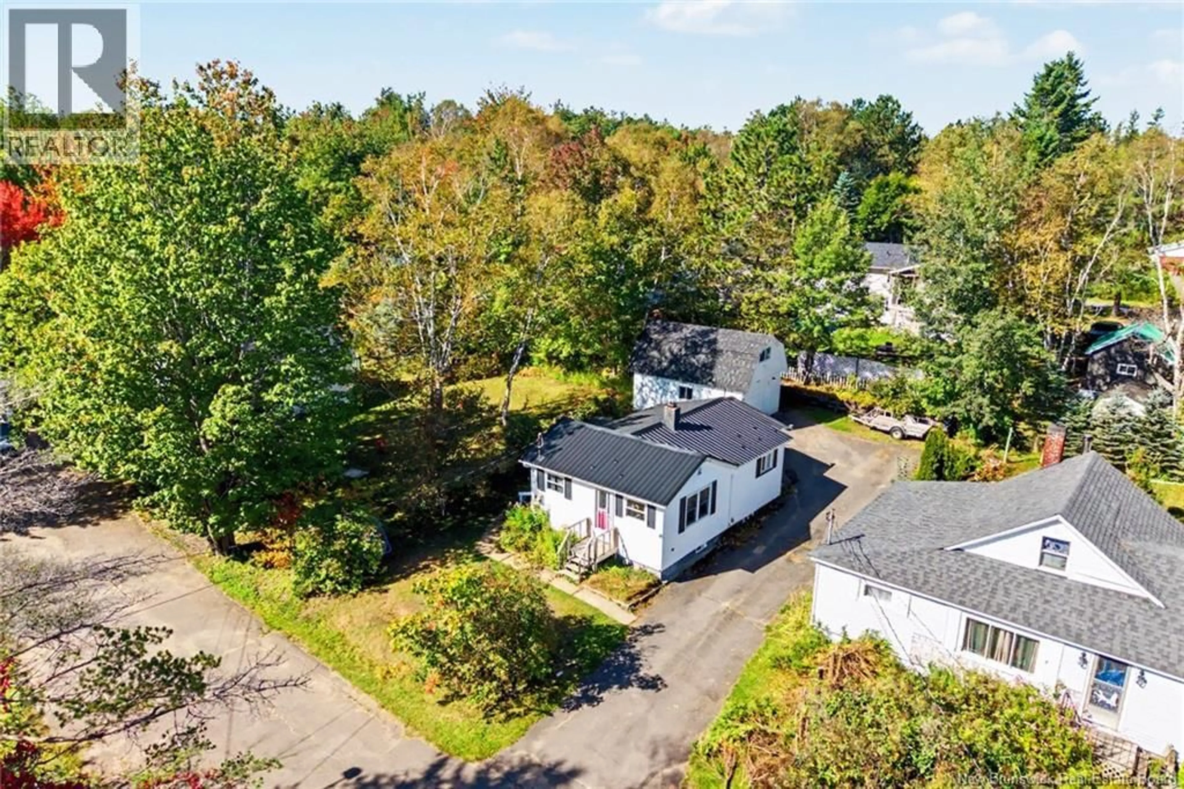 A pic from outside/outdoor area/front of a property/back of a property/a pic from drone, street for 74 CHESTNUT STREET, Minto New Brunswick E4B3L5