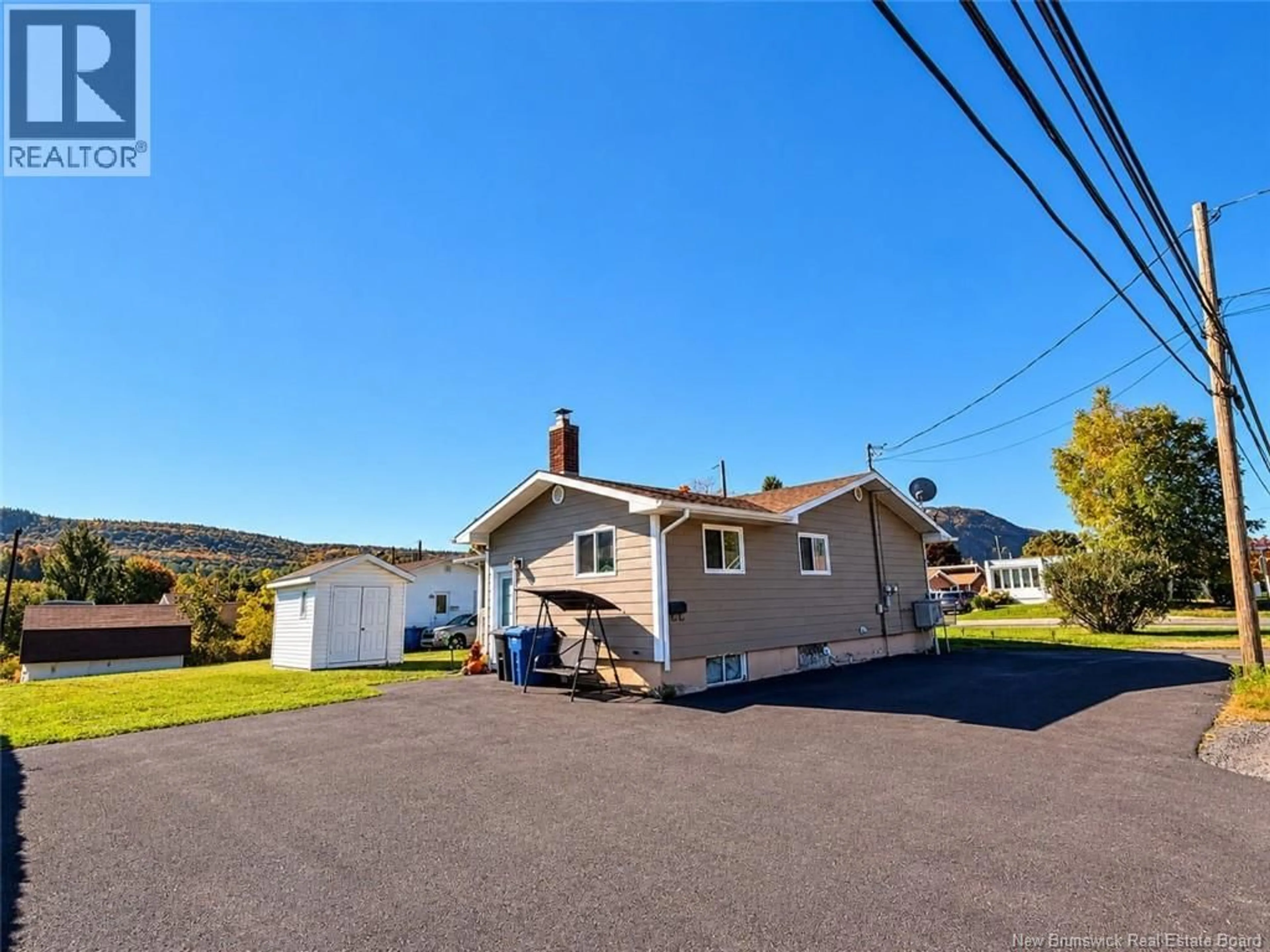 A pic from outside/outdoor area/front of a property/back of a property/a pic from drone, unknown for 2 WALSH AVENUE, Campbellton New Brunswick E3N2E1