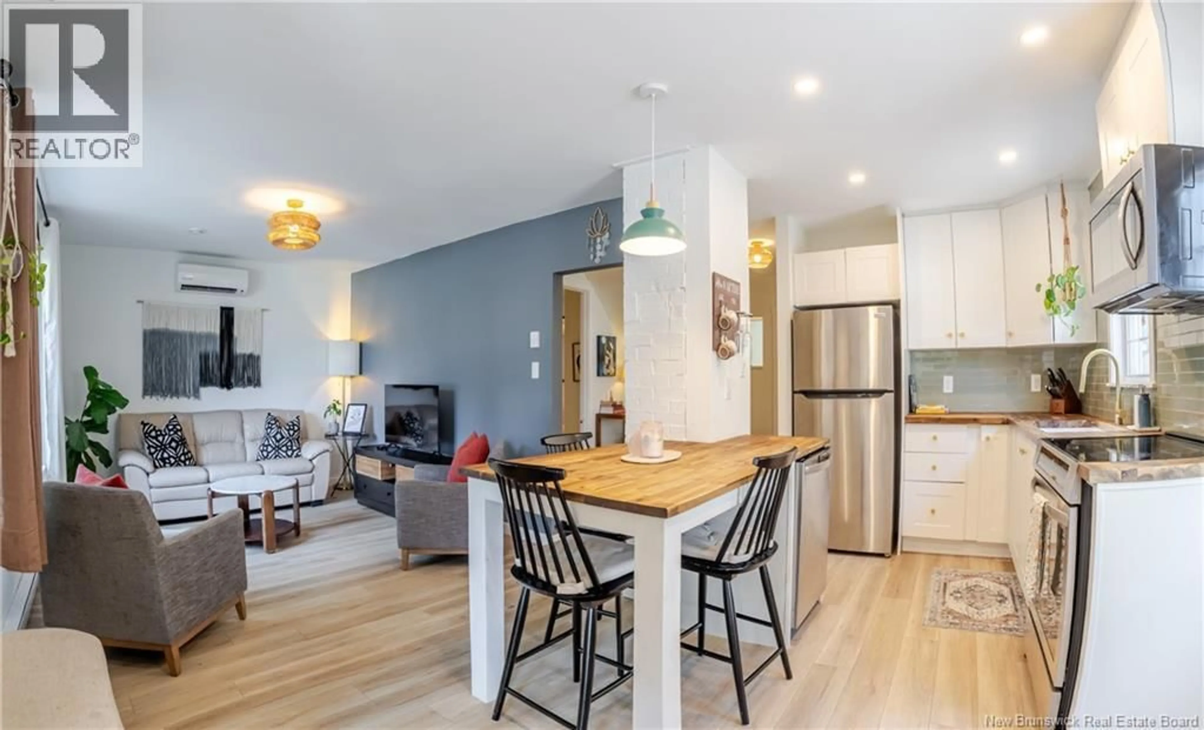Open concept kitchen, wood/laminate floor for 239 MEDLEY STREET, Fredericton New Brunswick E3A3B5