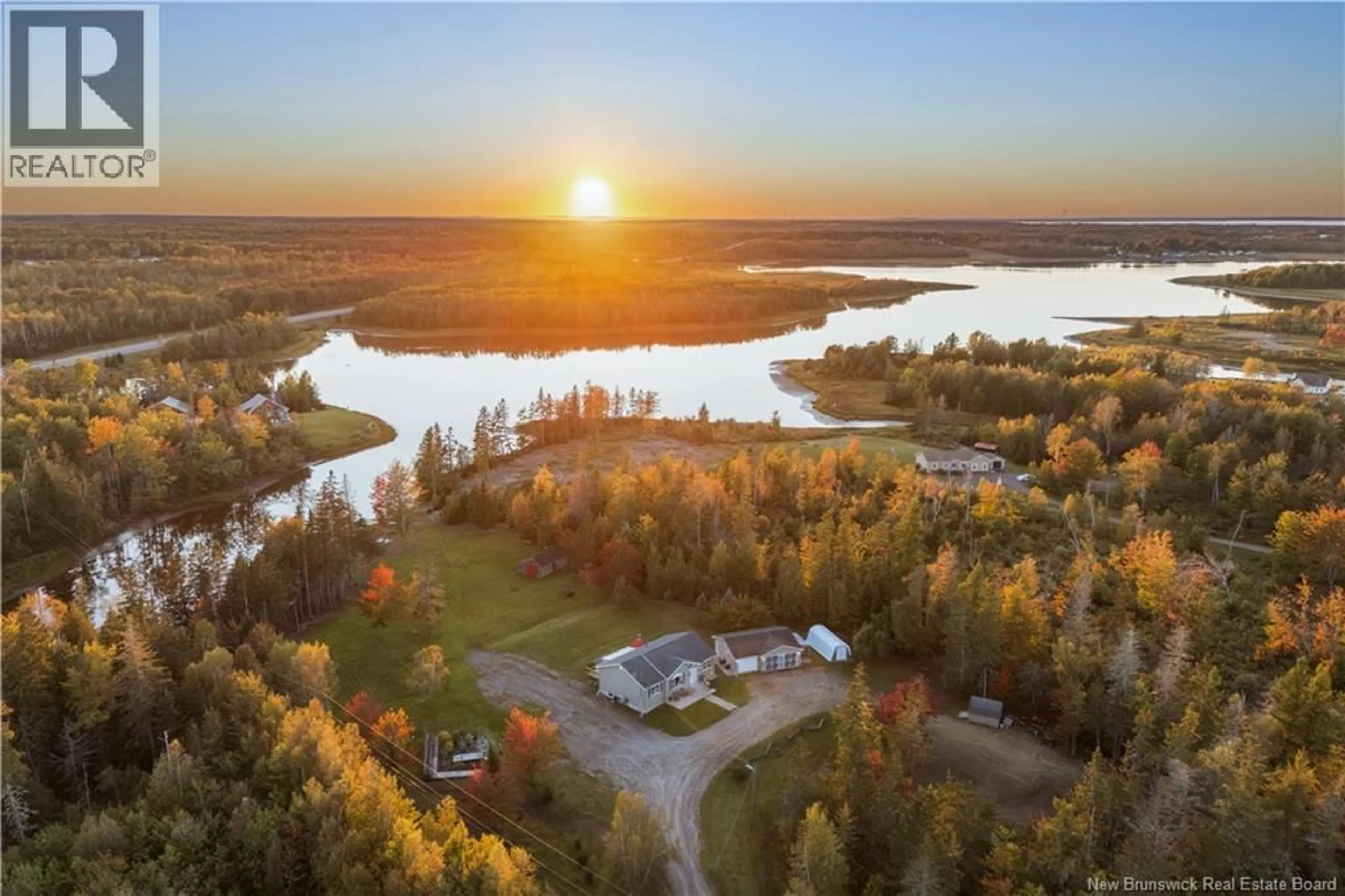 A pic from outside/outdoor area/front of a property/back of a property/a pic from drone, water/lake/river/ocean view for 177 RAYMEL, Grand-Barachois New Brunswick E4P7M7