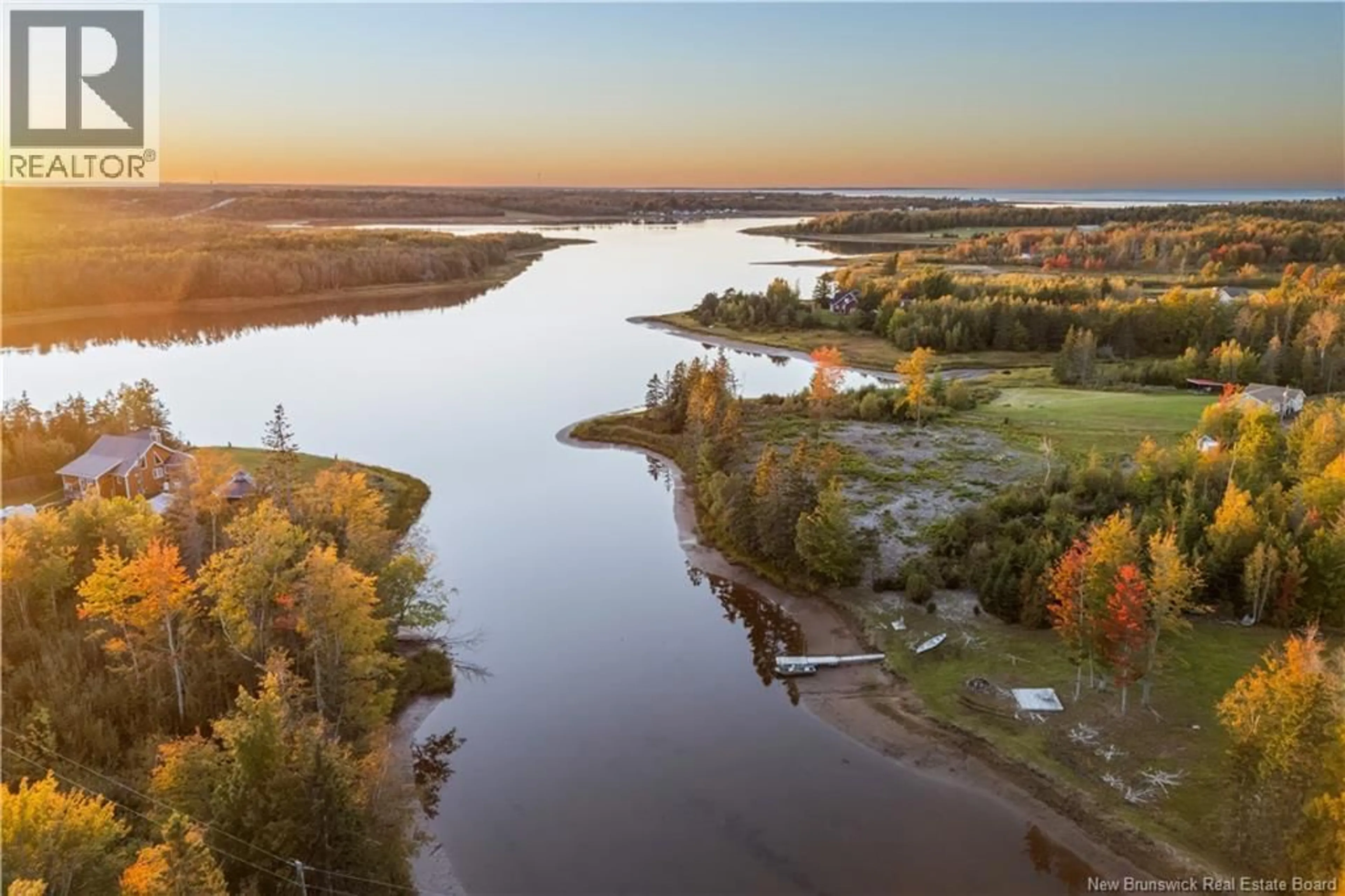 A pic from outside/outdoor area/front of a property/back of a property/a pic from drone, water/lake/river/ocean view for 177 RAYMEL, Grand-Barachois New Brunswick E4P7M7