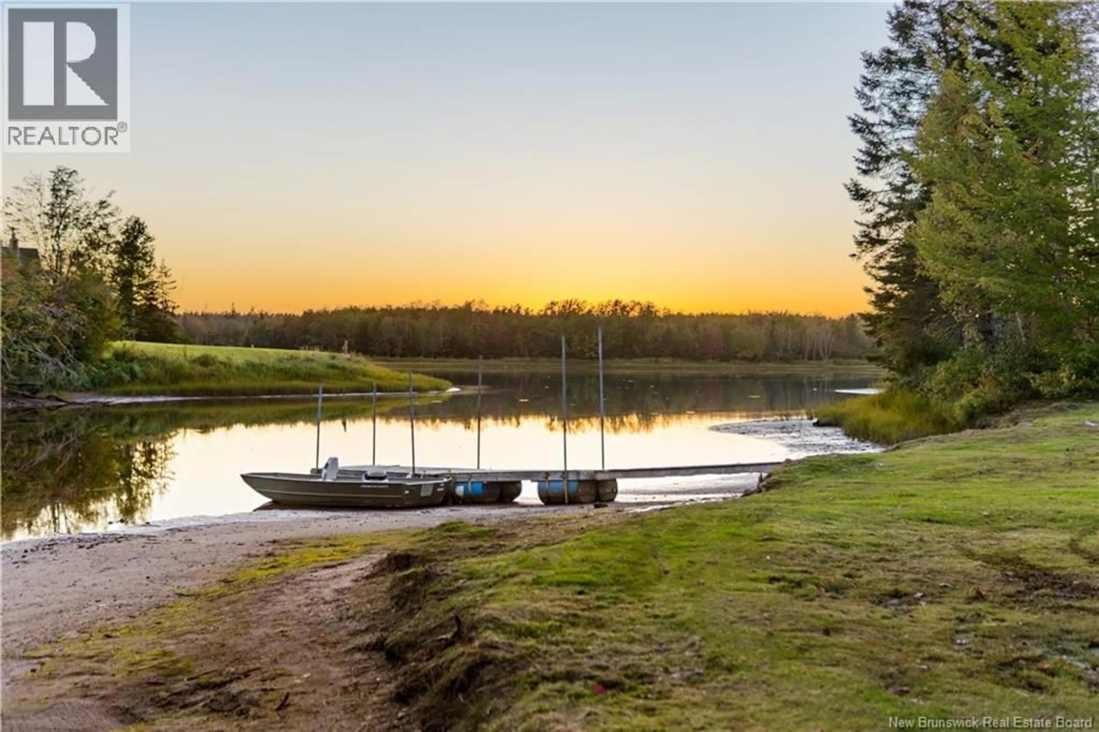 A pic from outside/outdoor area/front of a property/back of a property/a pic from drone, water/lake/river/ocean view for 177 RAYMEL, Grand-Barachois New Brunswick E4P7M7