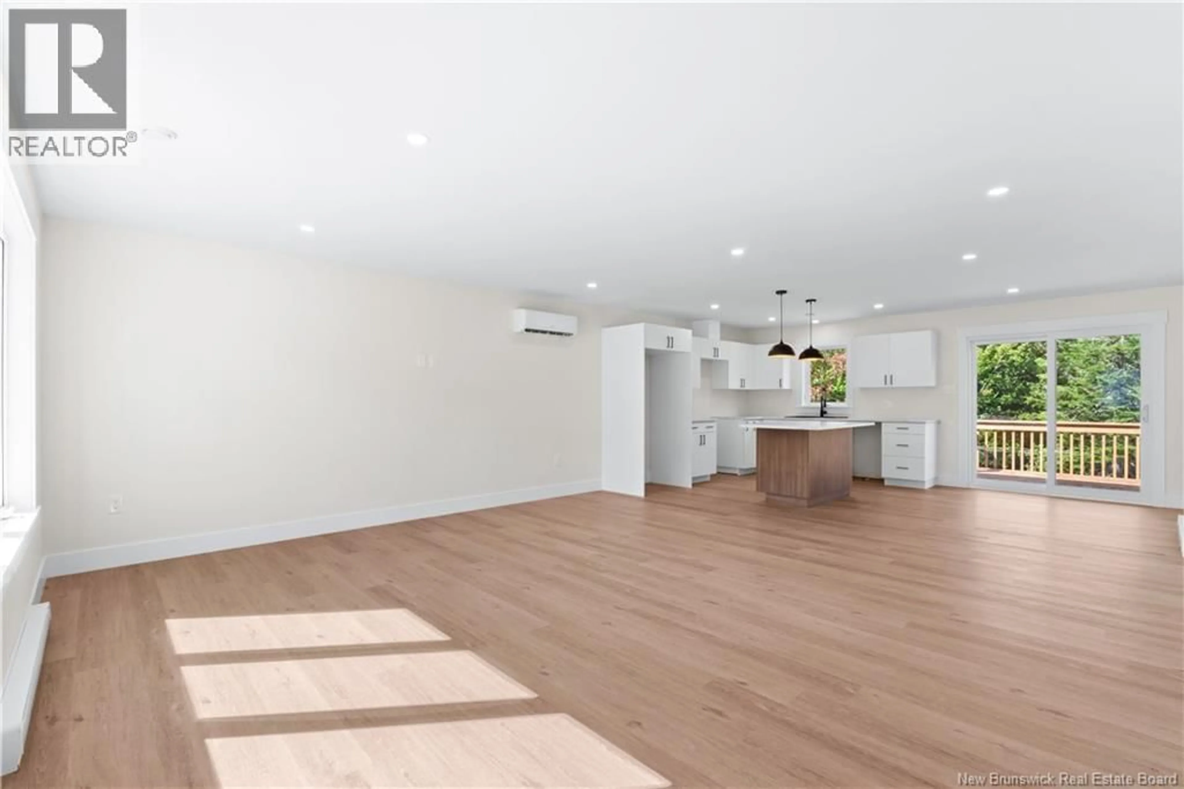 Open concept kitchen, wood/laminate floor for 32 DENIS, Saint-Antoine New Brunswick E4V0E6