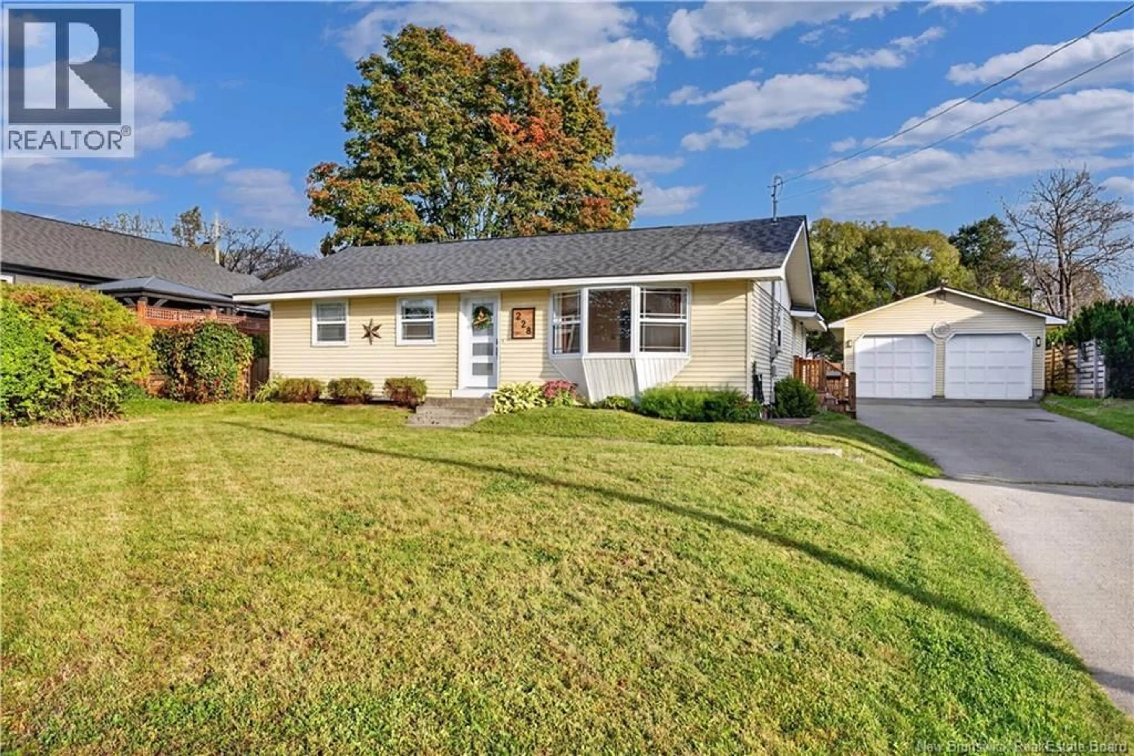 Home with vinyl exterior material, street for 228 WELLINGTON STREET, Miramichi New Brunswick E1N1M9