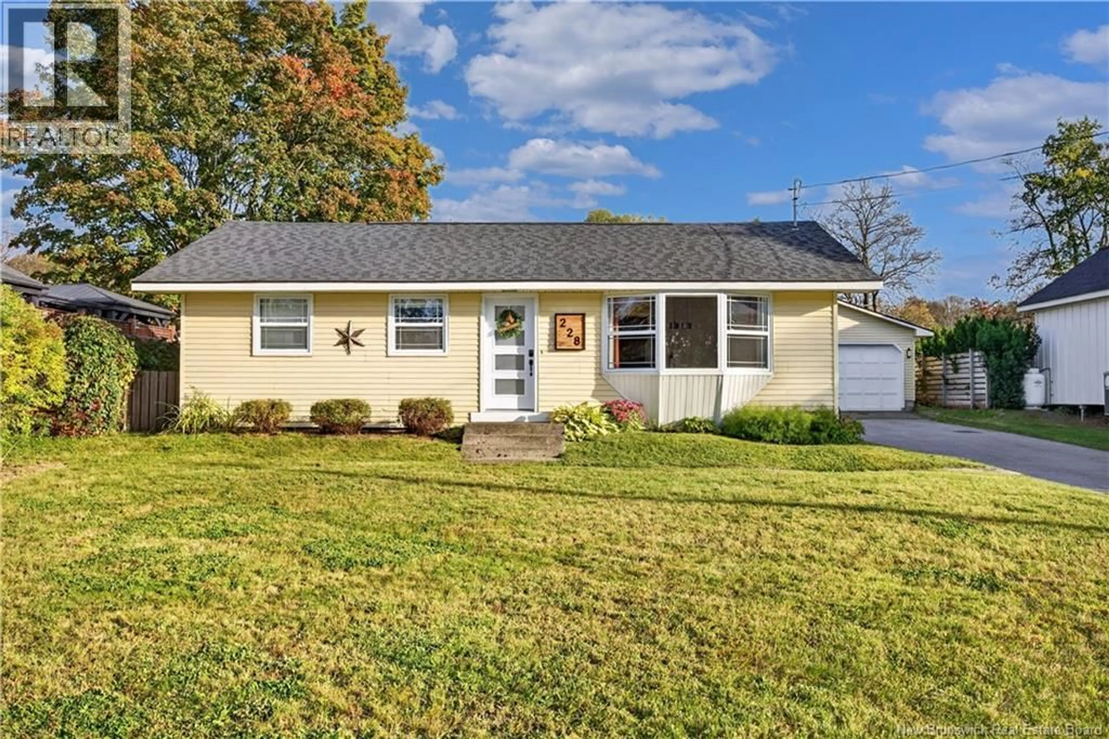 Home with vinyl exterior material, street for 228 WELLINGTON STREET, Miramichi New Brunswick E1N1M9