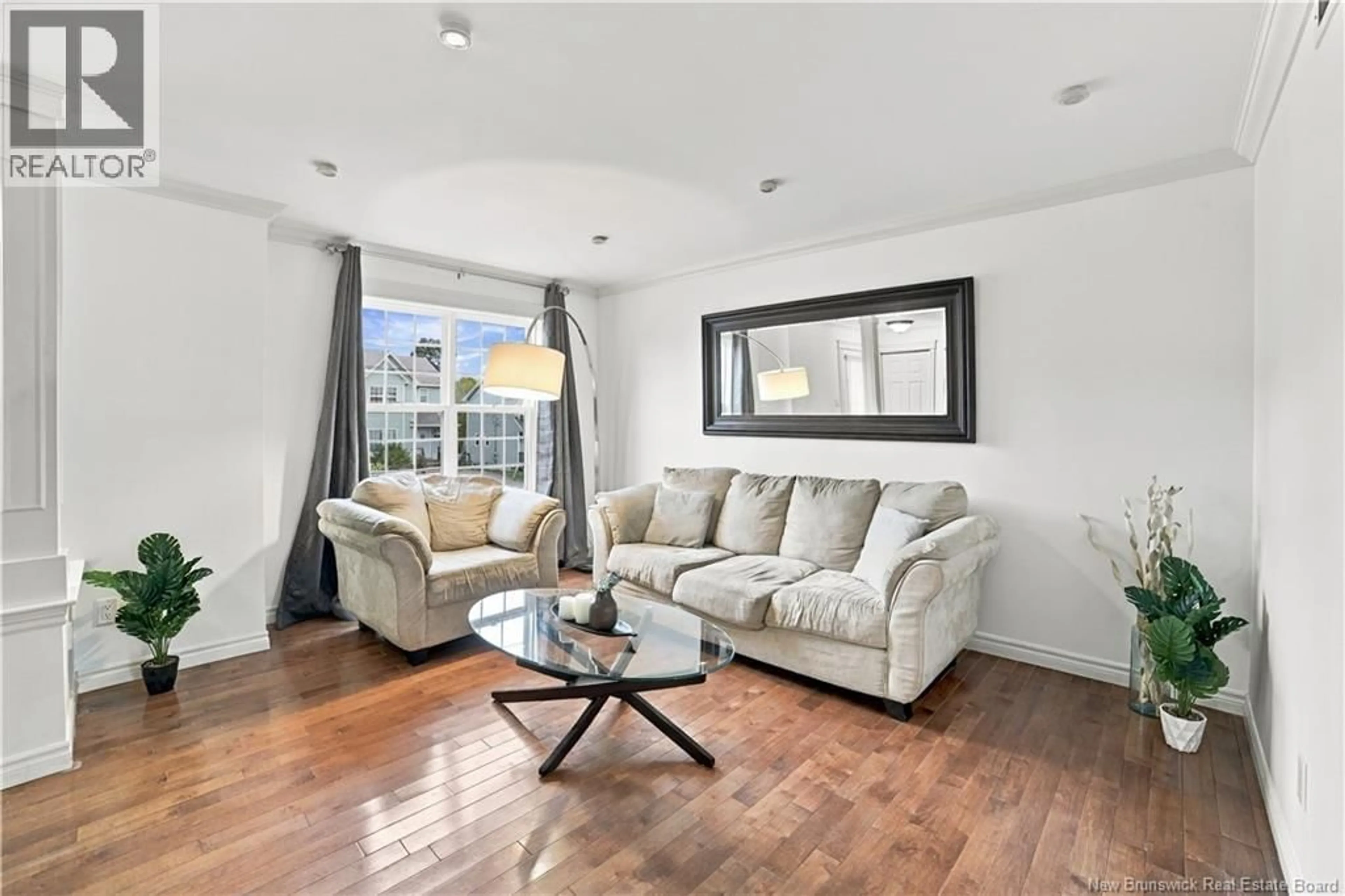 Living room with furniture, wood/laminate floor for 156 HOULAHAN STREET, Dieppe New Brunswick E1A4X6