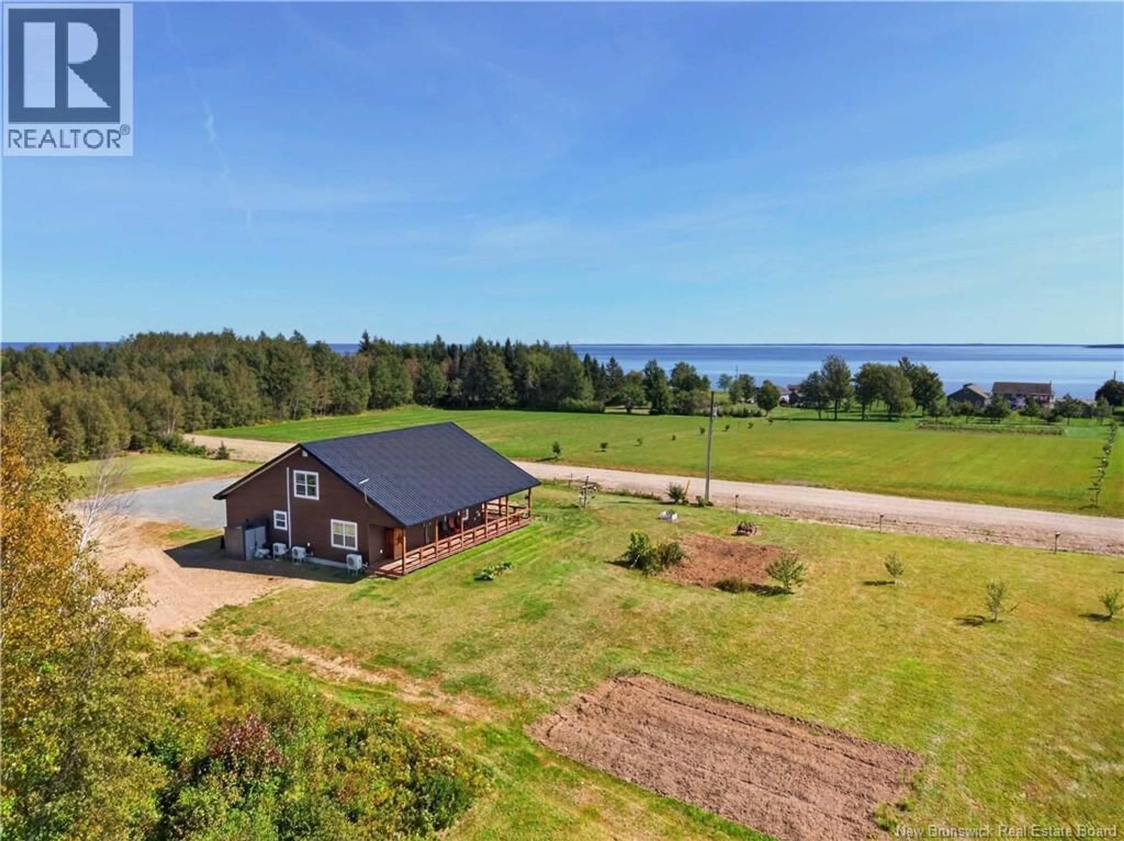 A pic from outside/outdoor area/front of a property/back of a property/a pic from drone, water/lake/river/ocean view for 270 OAK POINT ROAD, Oak Point New Brunswick E1V7K5