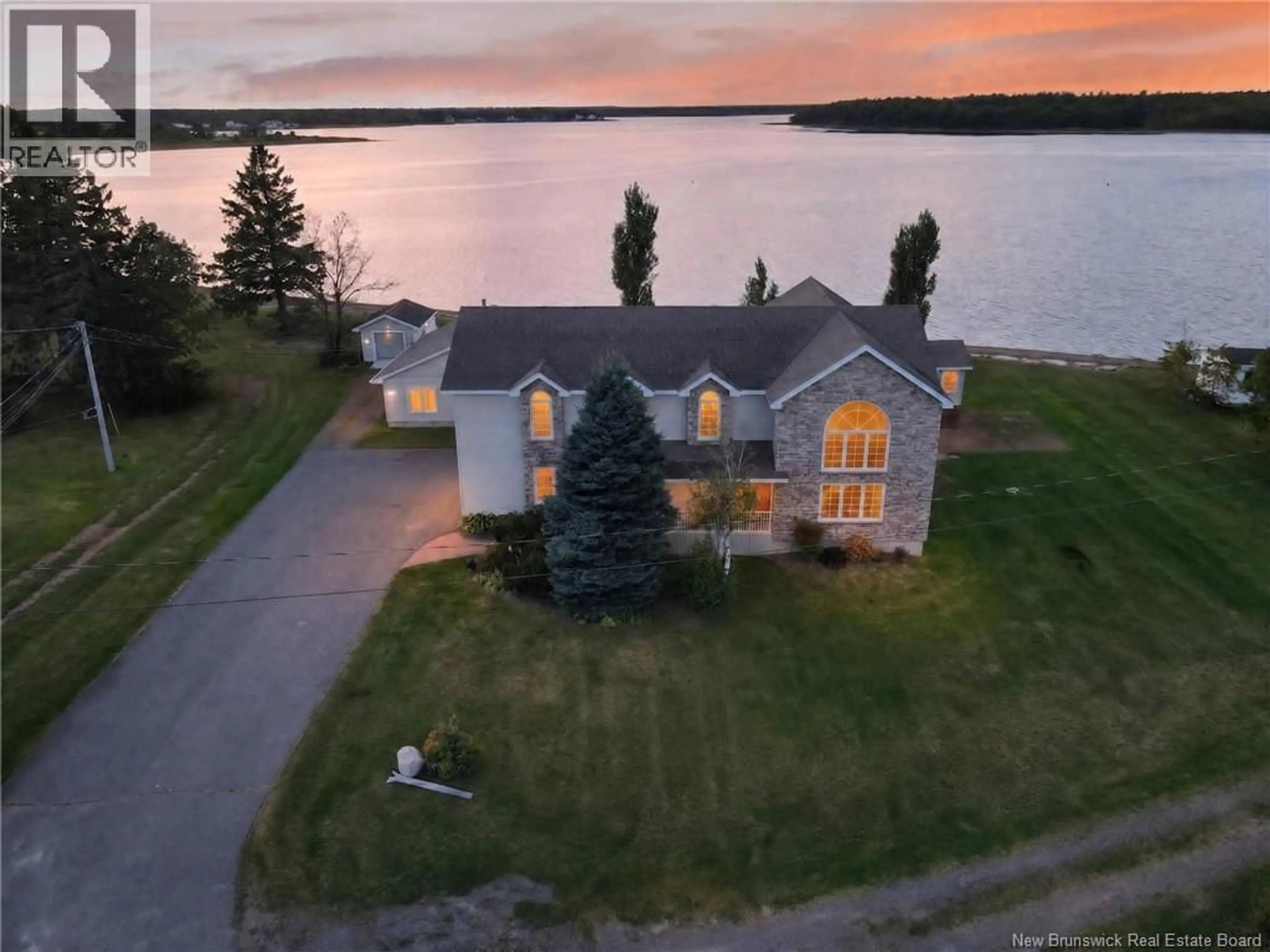 A pic from outside/outdoor area/front of a property/back of a property/a pic from drone, water/lake/river/ocean view for 79 POINTE DU MIRAGE ROAD, Aldouane New Brunswick E4W5C7