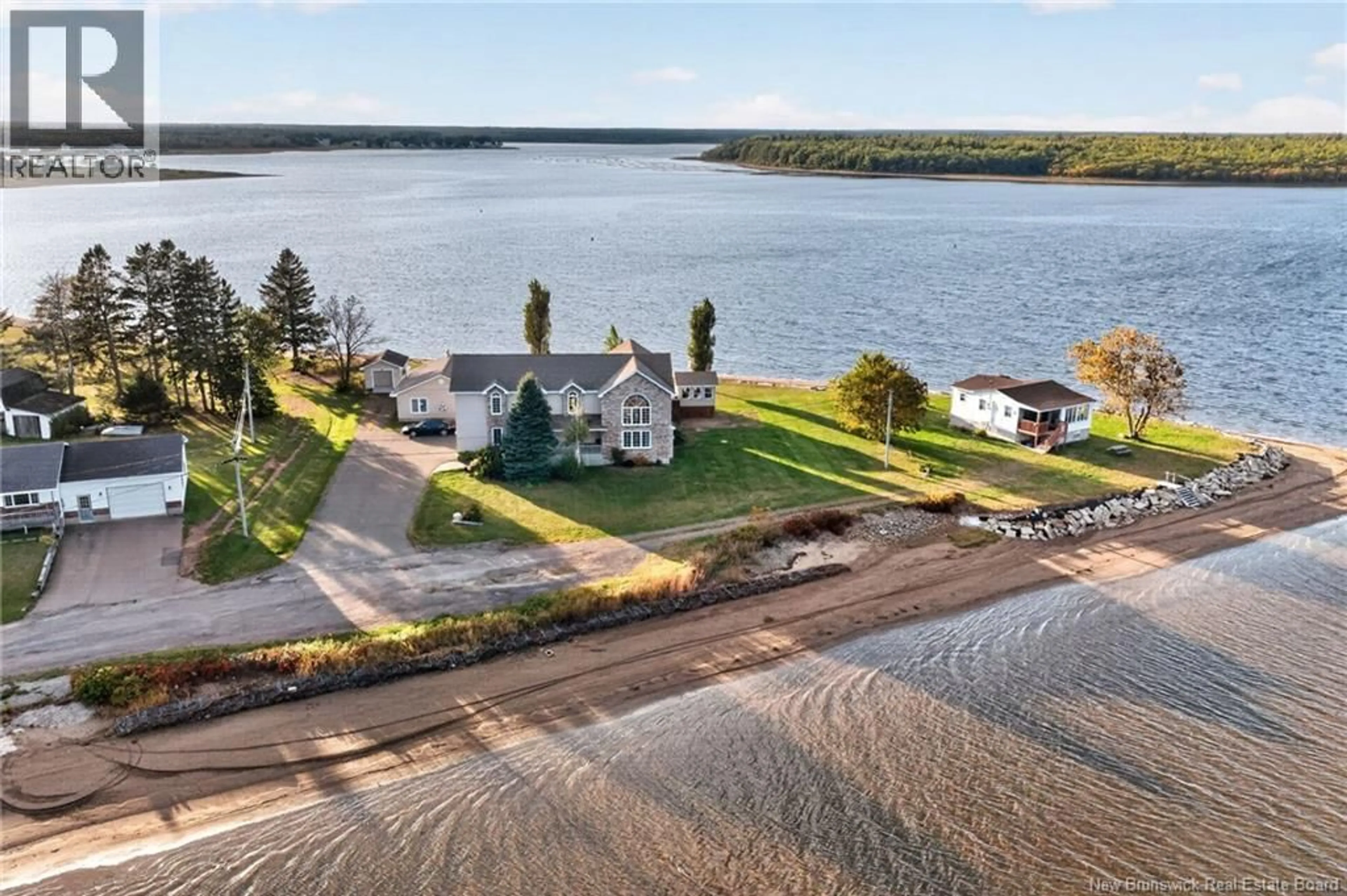 A pic from outside/outdoor area/front of a property/back of a property/a pic from drone, water/lake/river/ocean view for 79 POINTE DU MIRAGE ROAD, Aldouane New Brunswick E4W5C7